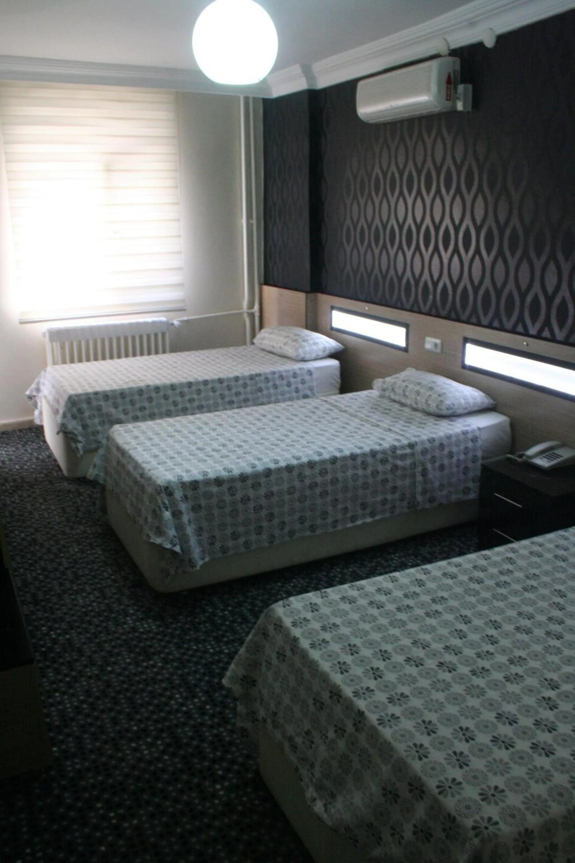 Bed in Yeni Kosk Esra Hotel