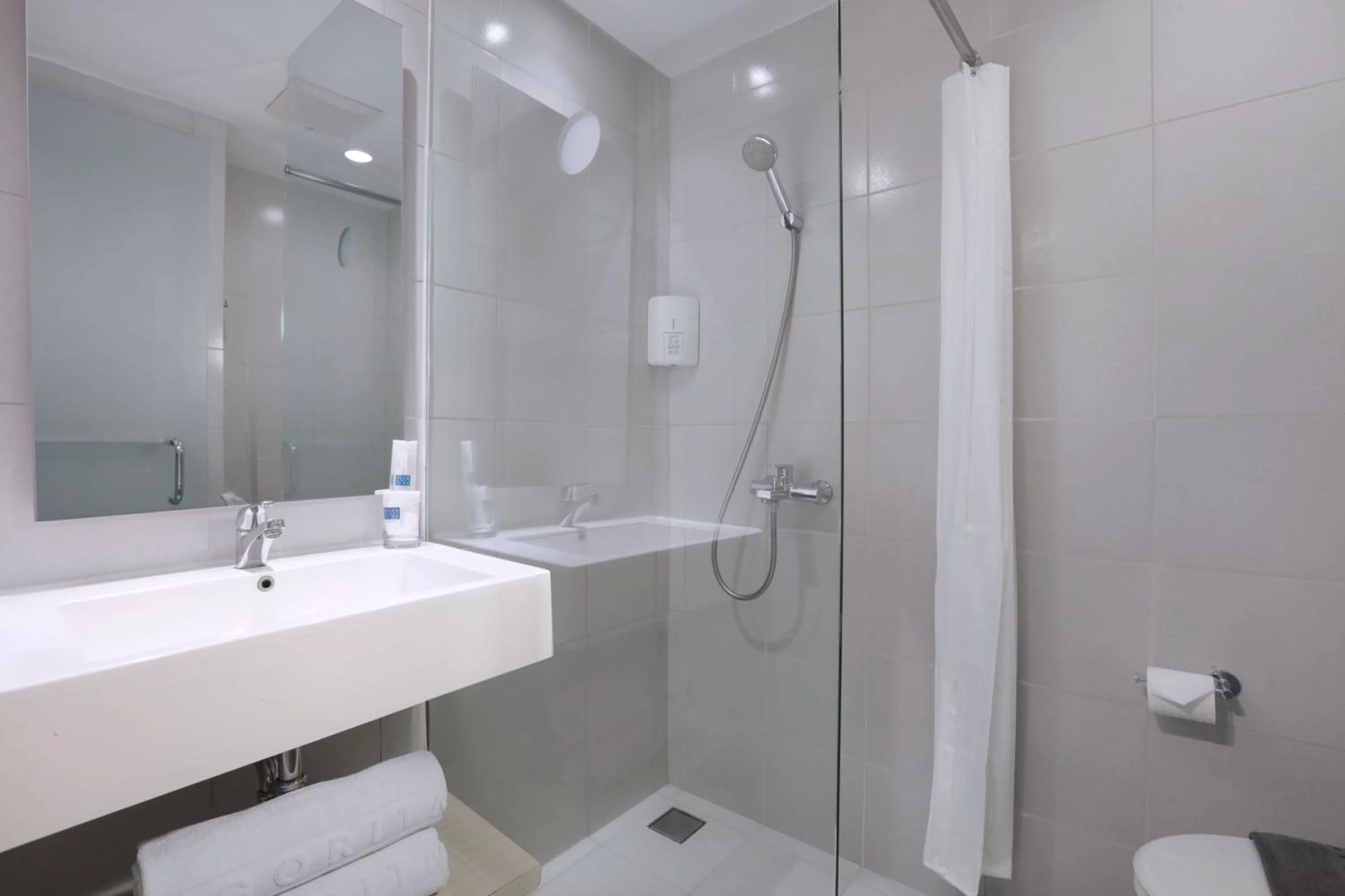 Bathroom in Zuri Express Palembang