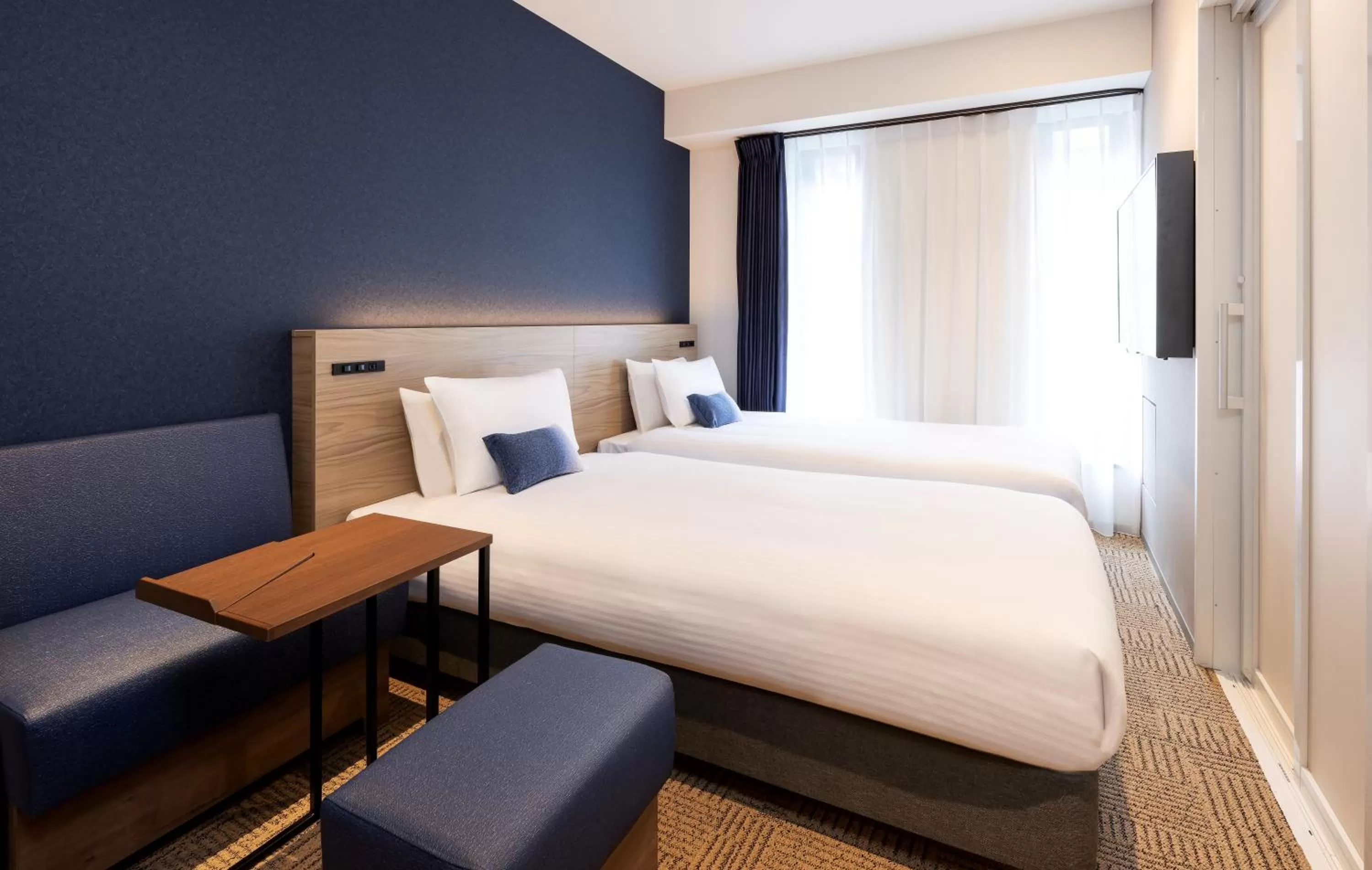 Photo of the whole room, Bed in HOTEL AMANEK Shinjuku Kabukicho