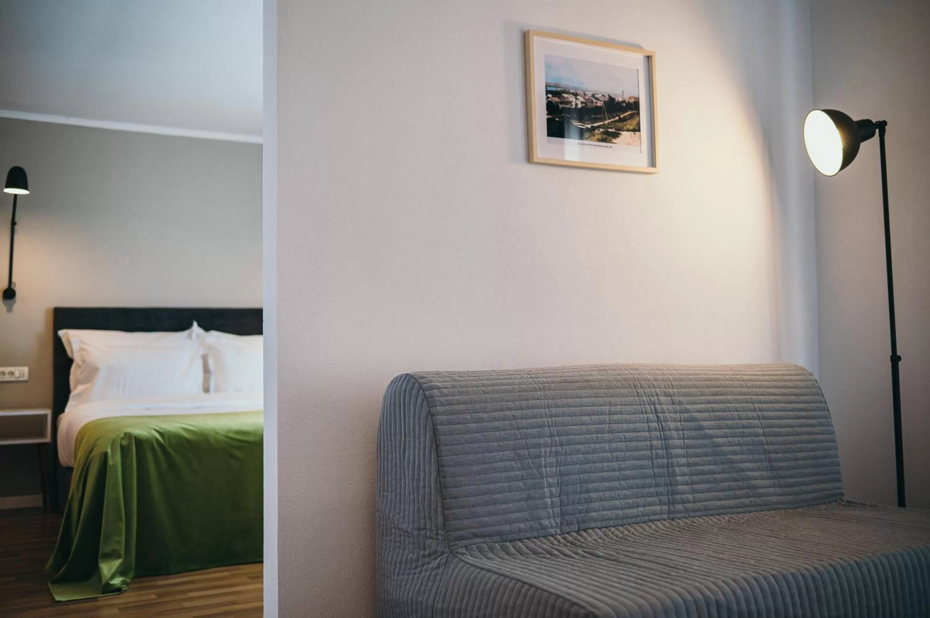 Living room, Bed in Nest Guesthouse