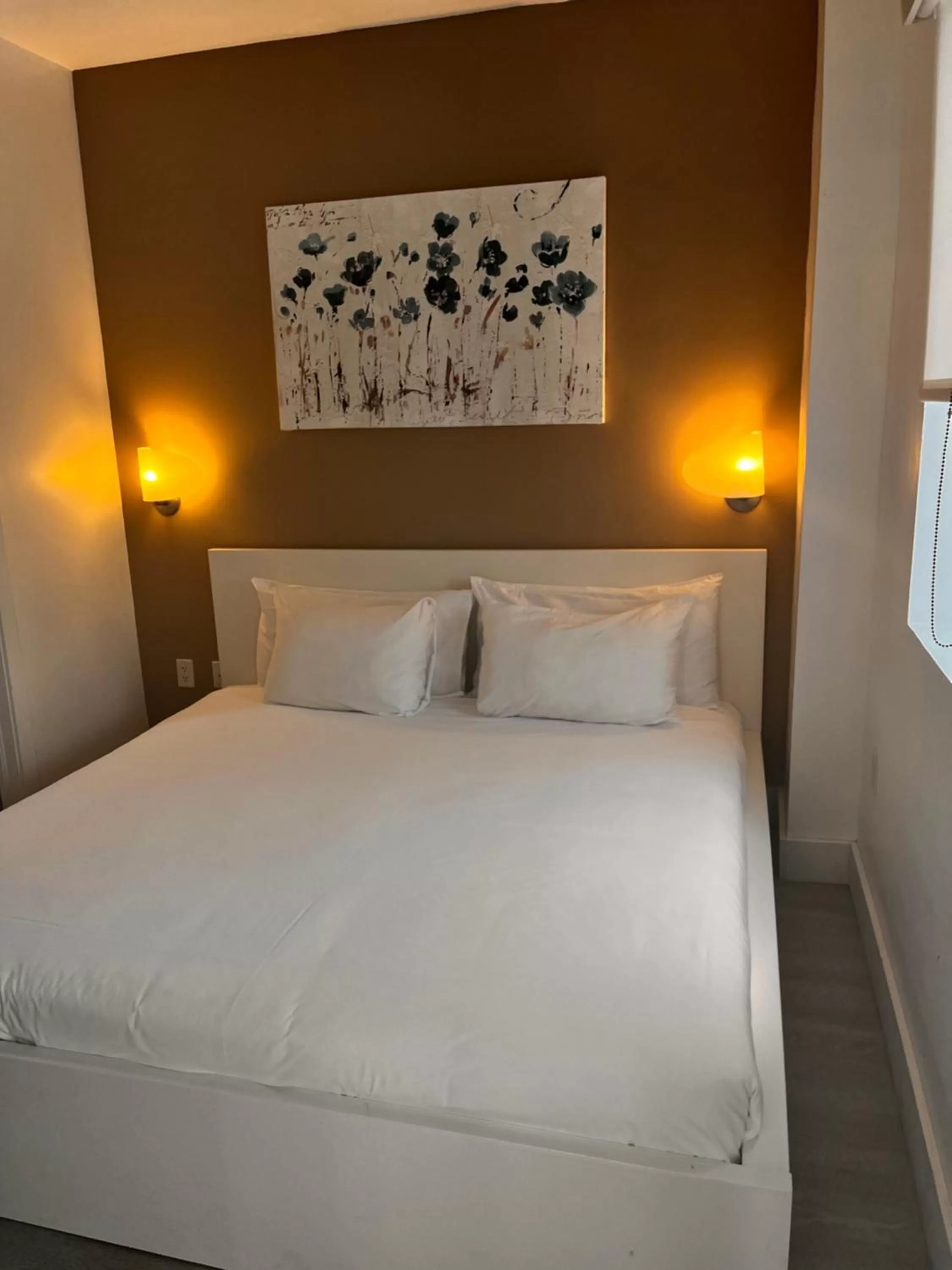 Bed in Suites at The Strand on Ocean Drive