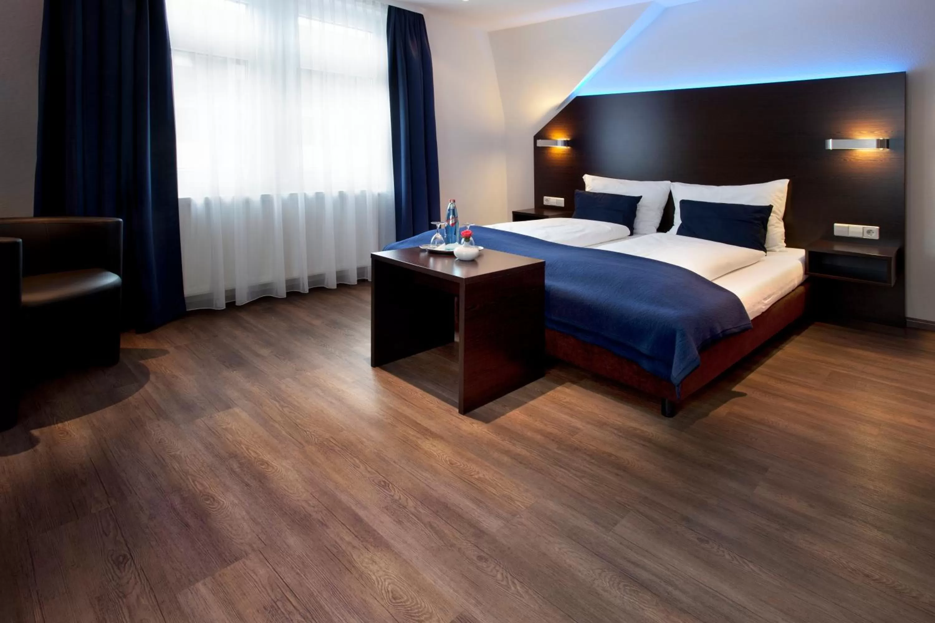 Photo of the whole room, Bed in Schlotzeria Hotel I Café I Eis