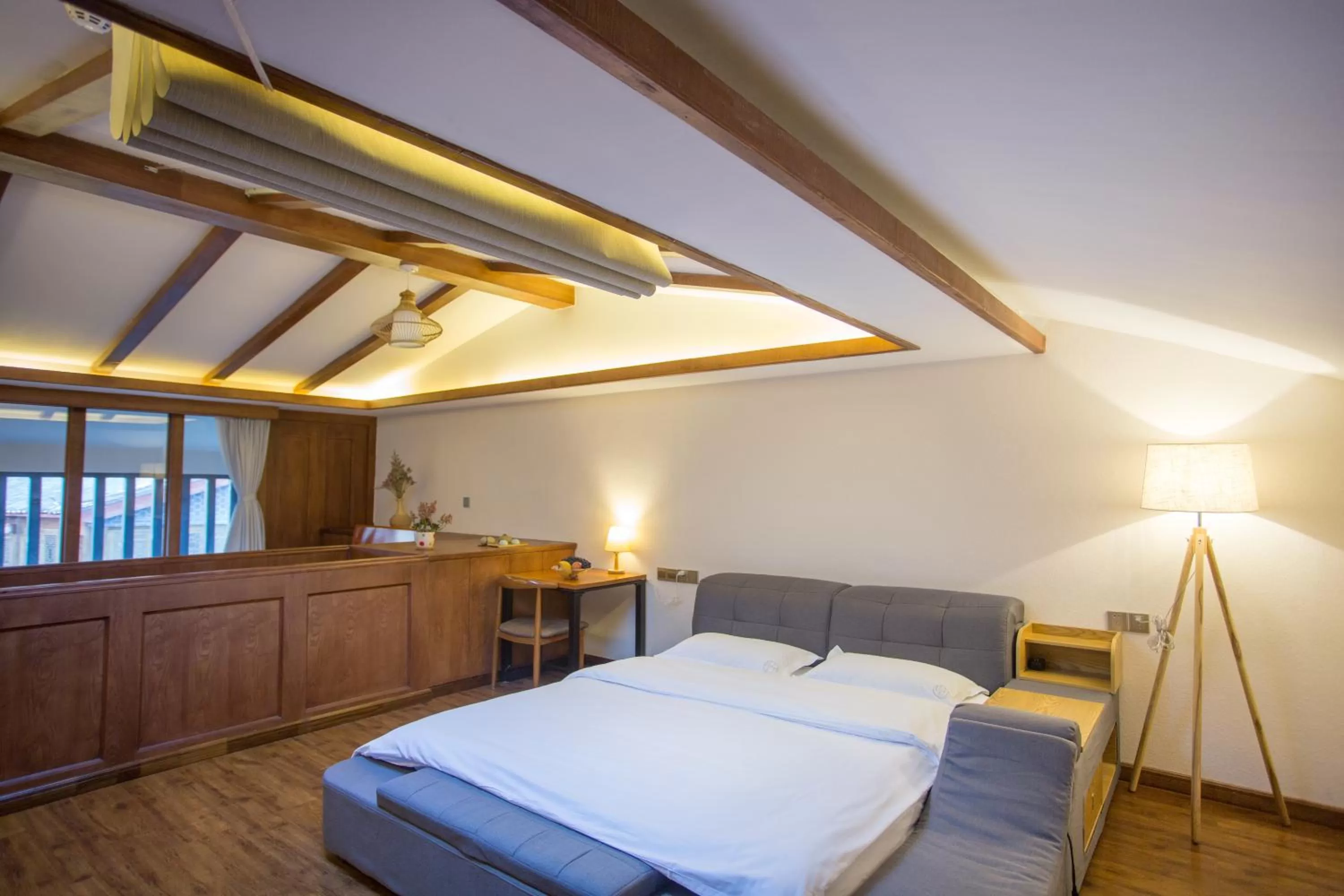 Bed in Lijiang Gemmer Hotel