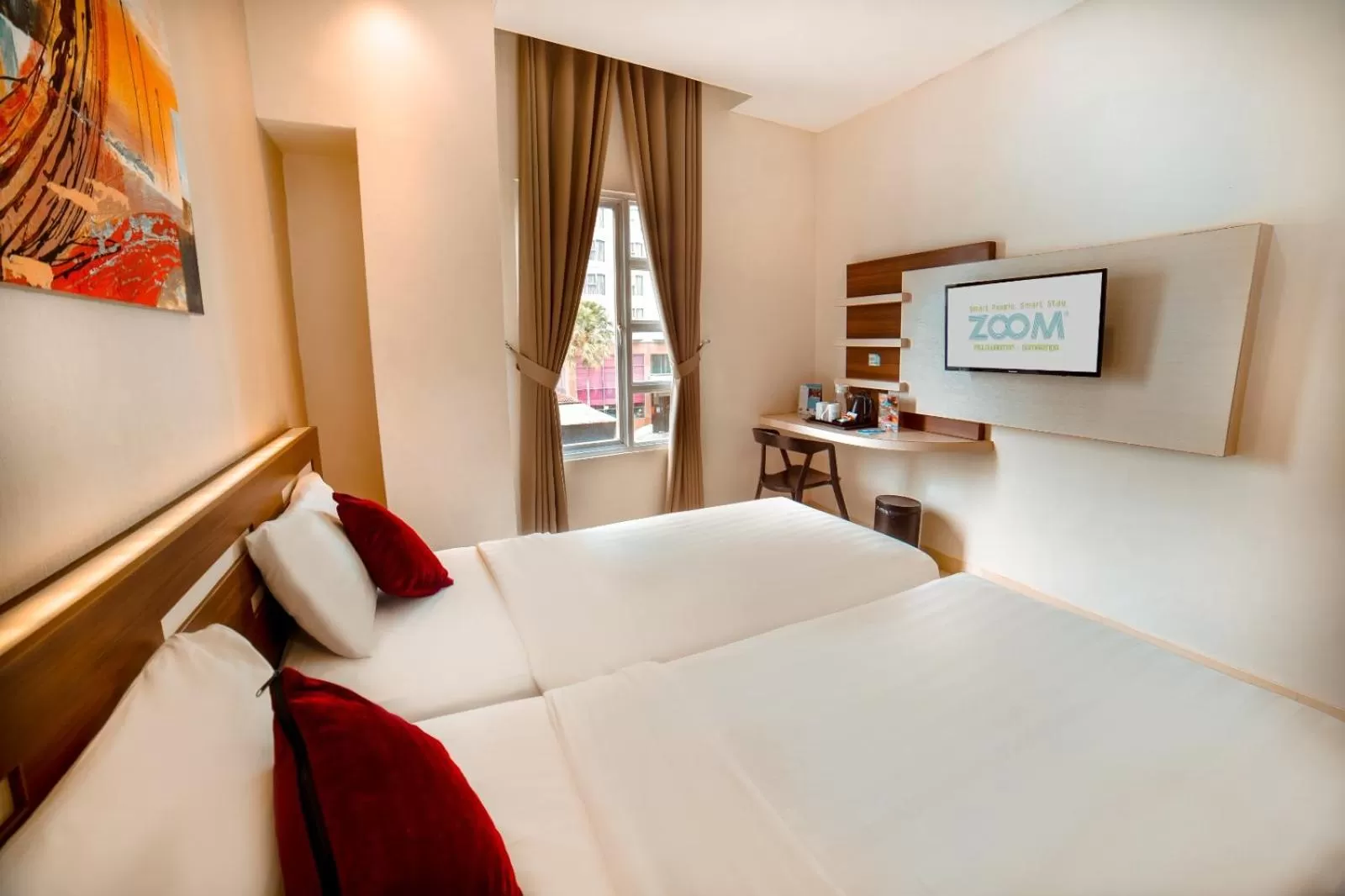 Bed in Zoom Hotel Mulawarman