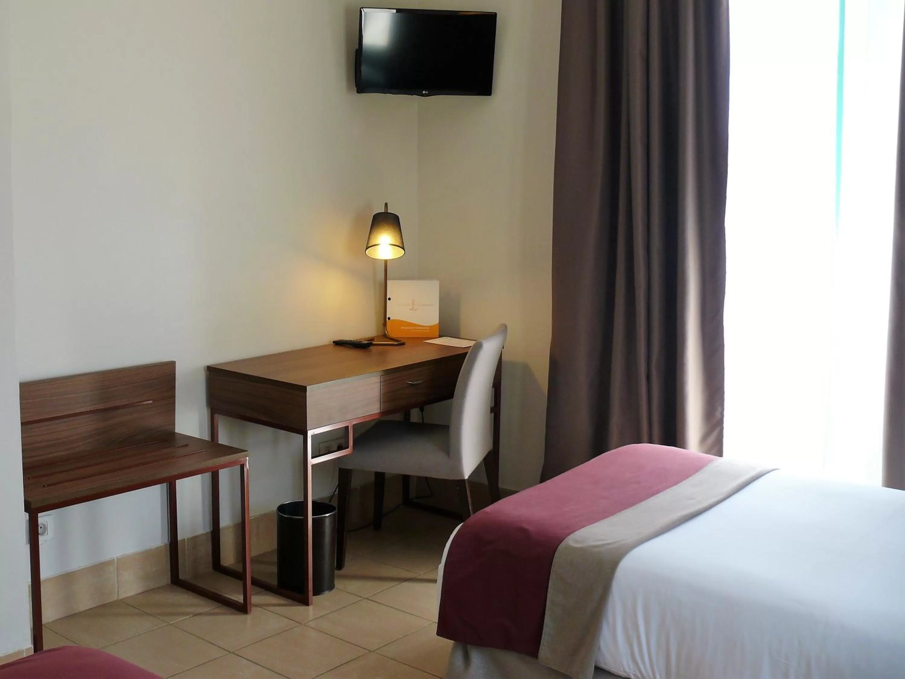 Bed in Hotel Oromana