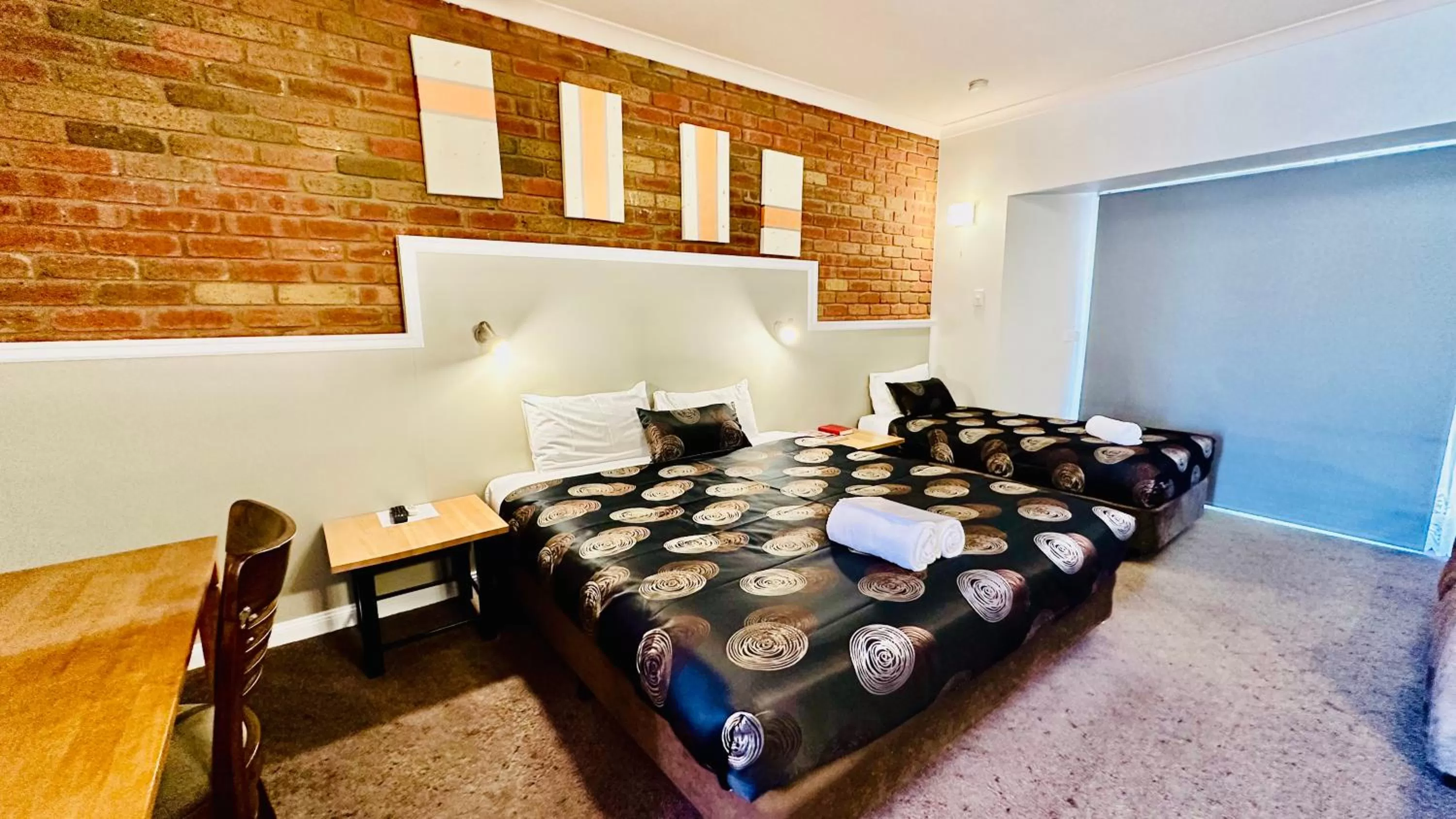 Bed in Early Australian Motor Inn