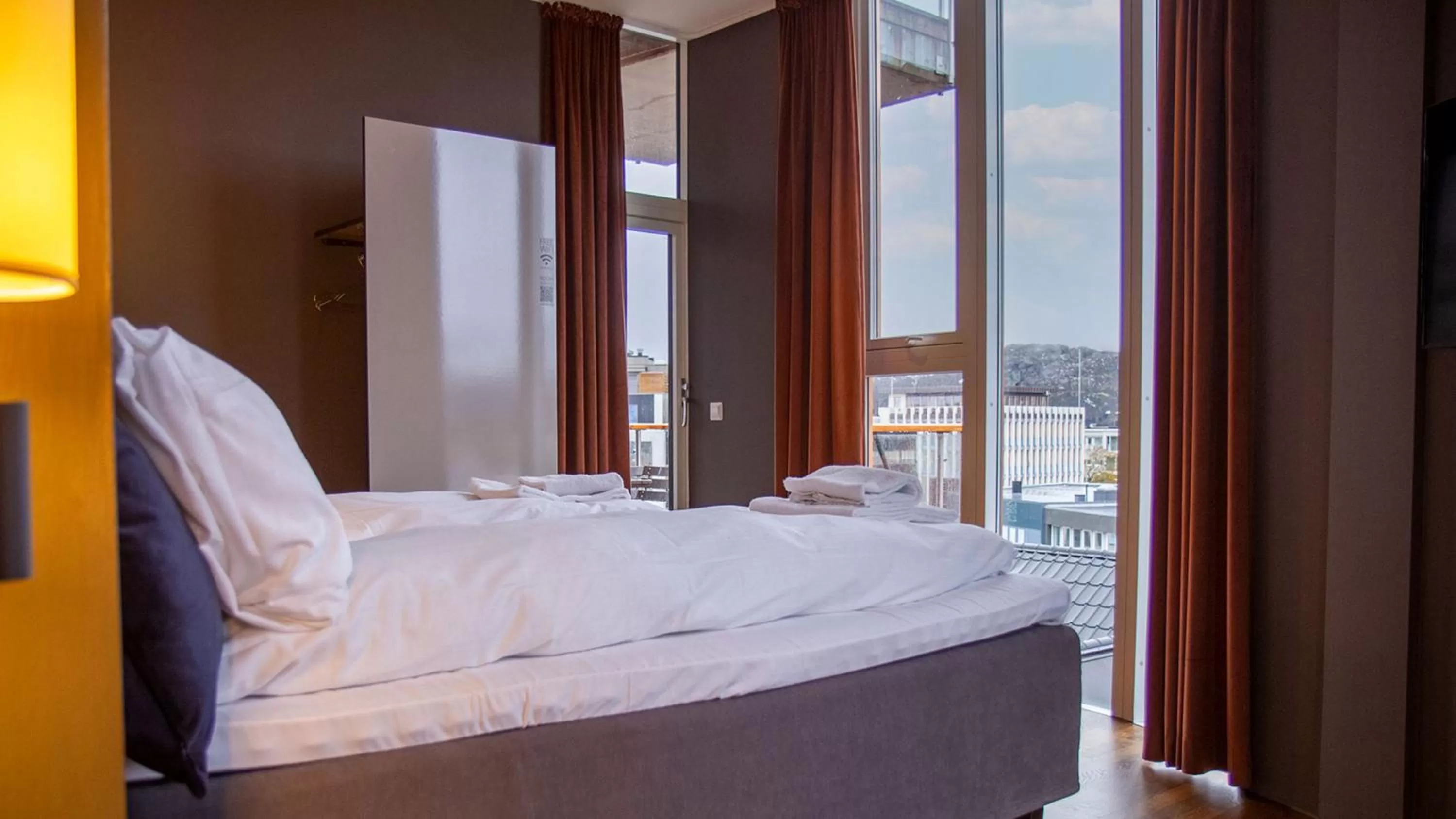 Bed in Nordis Apartments