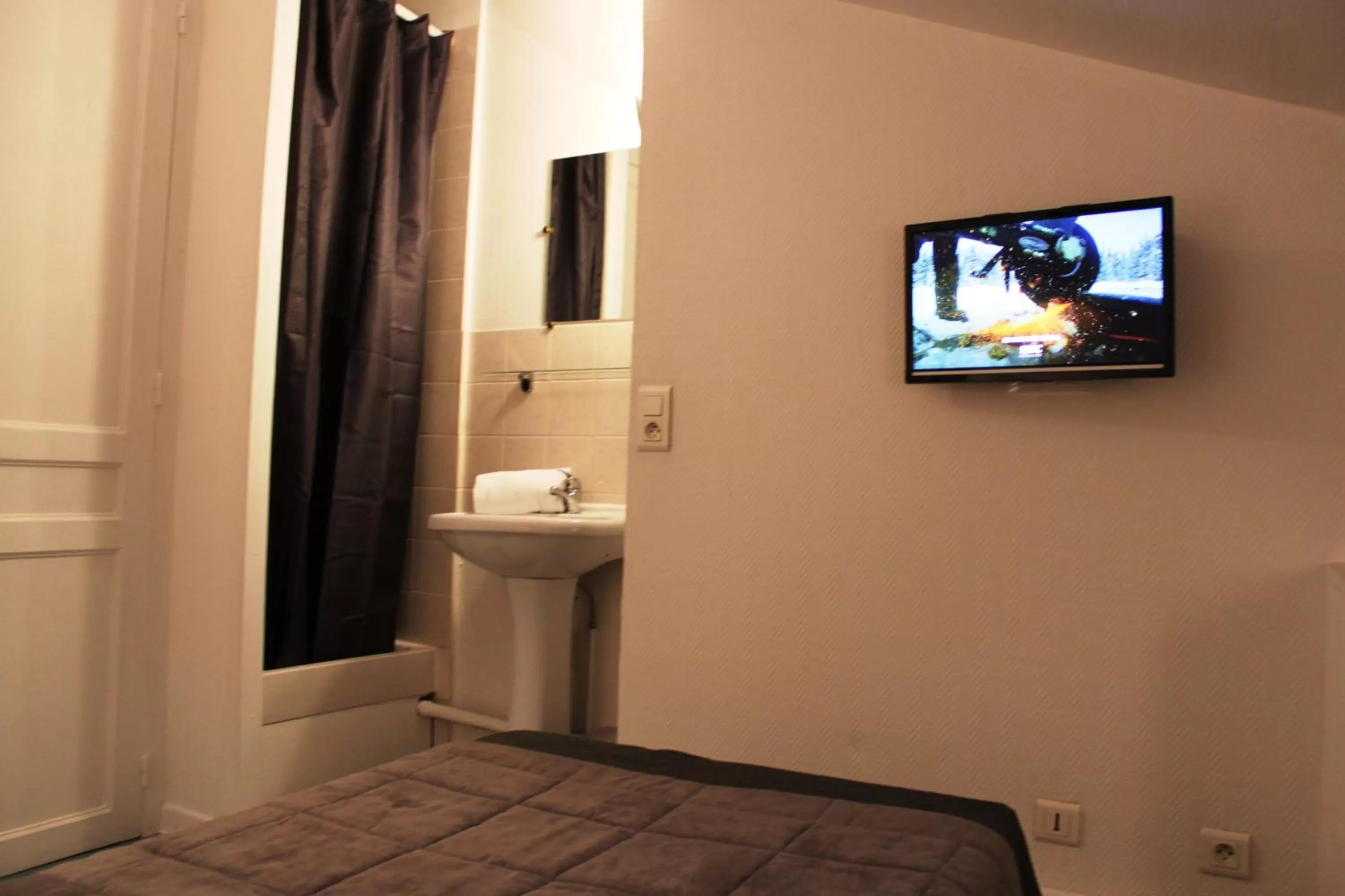 TV/Entertainment Center in Résidence et Chambres d'Hôtes de La Porte d'Arras