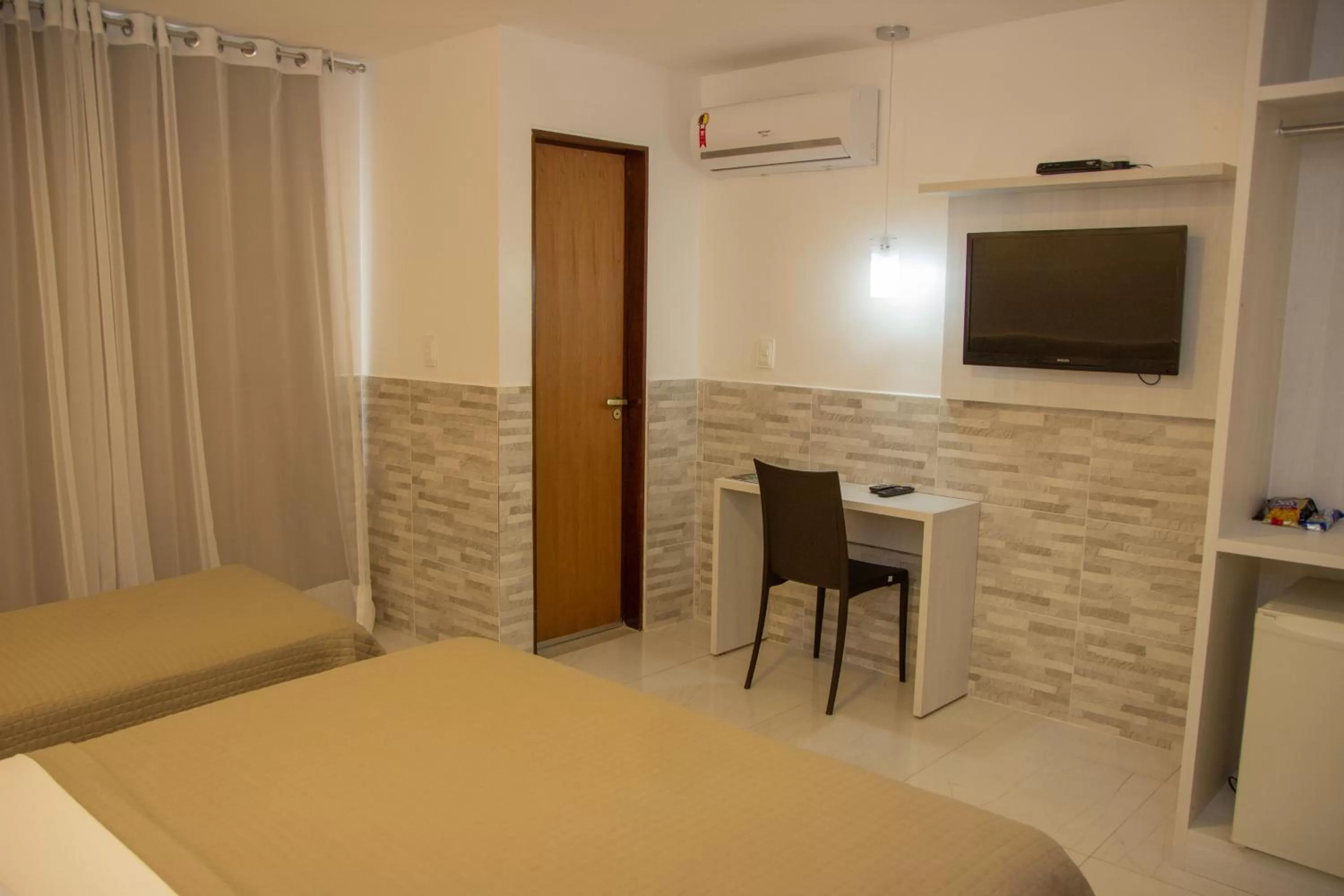 TV/Entertainment Center in Hotel Costa do Atlântico