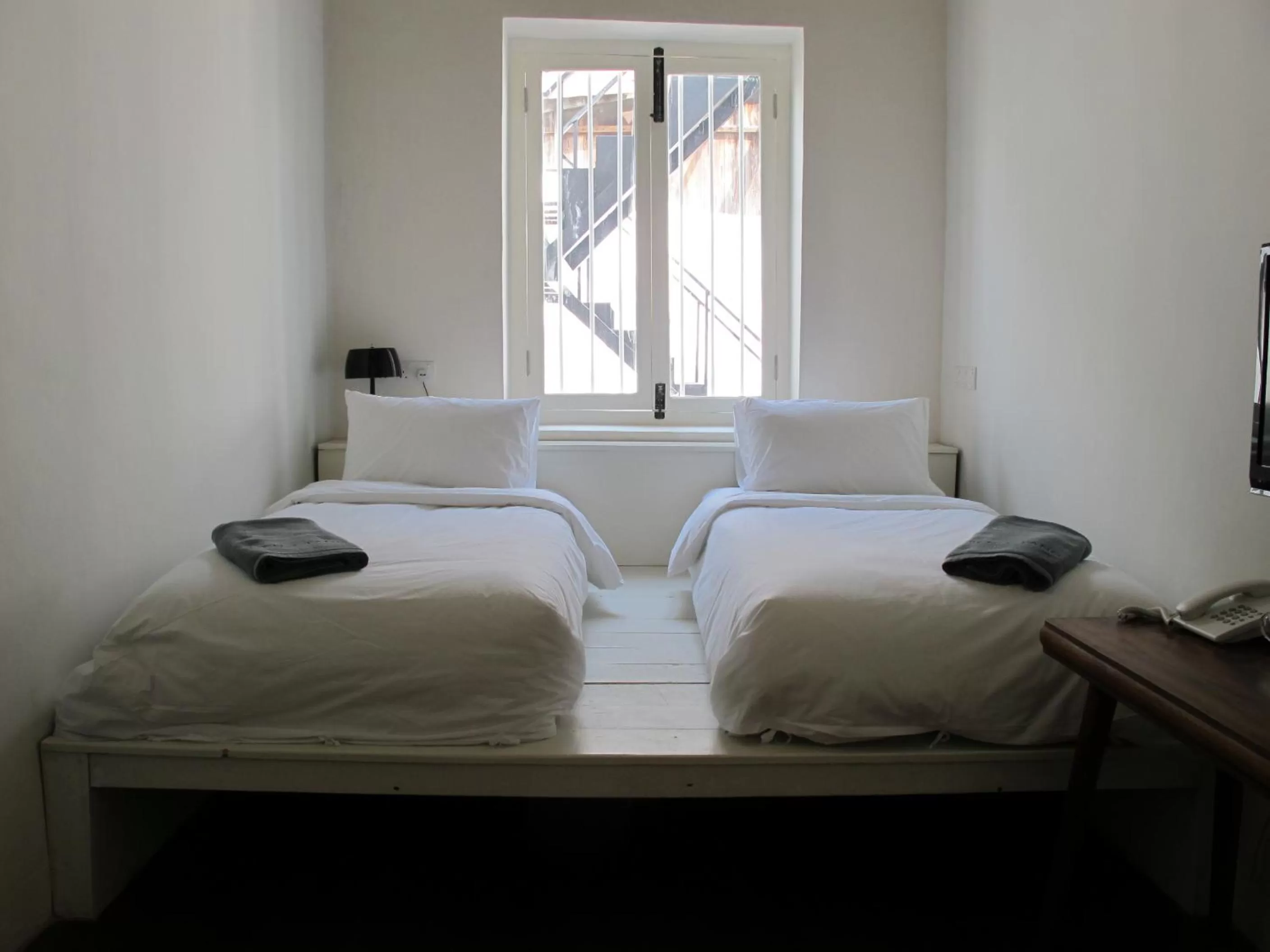 Bed in Ren I Tang Heritage Inn