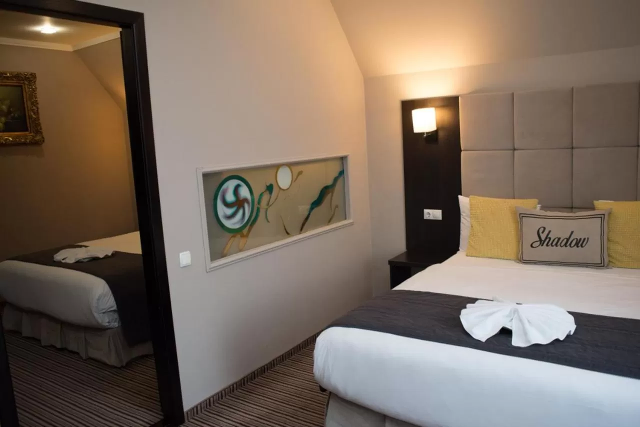 Bed in Shadow Boutique Hotel & SPA