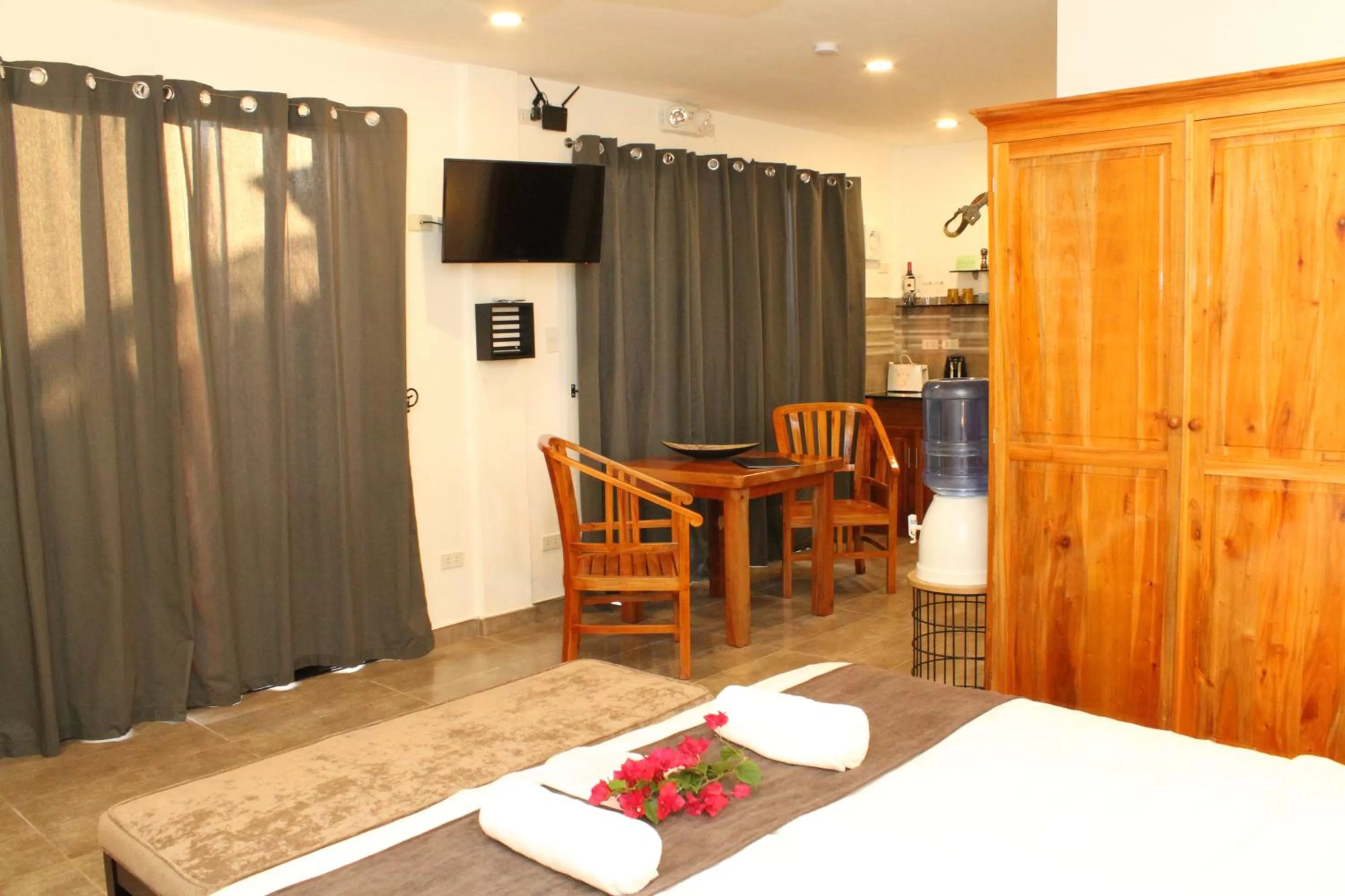 Living room, TV/Entertainment Center in Alona's Coral Garden Resort (Adult-Only)