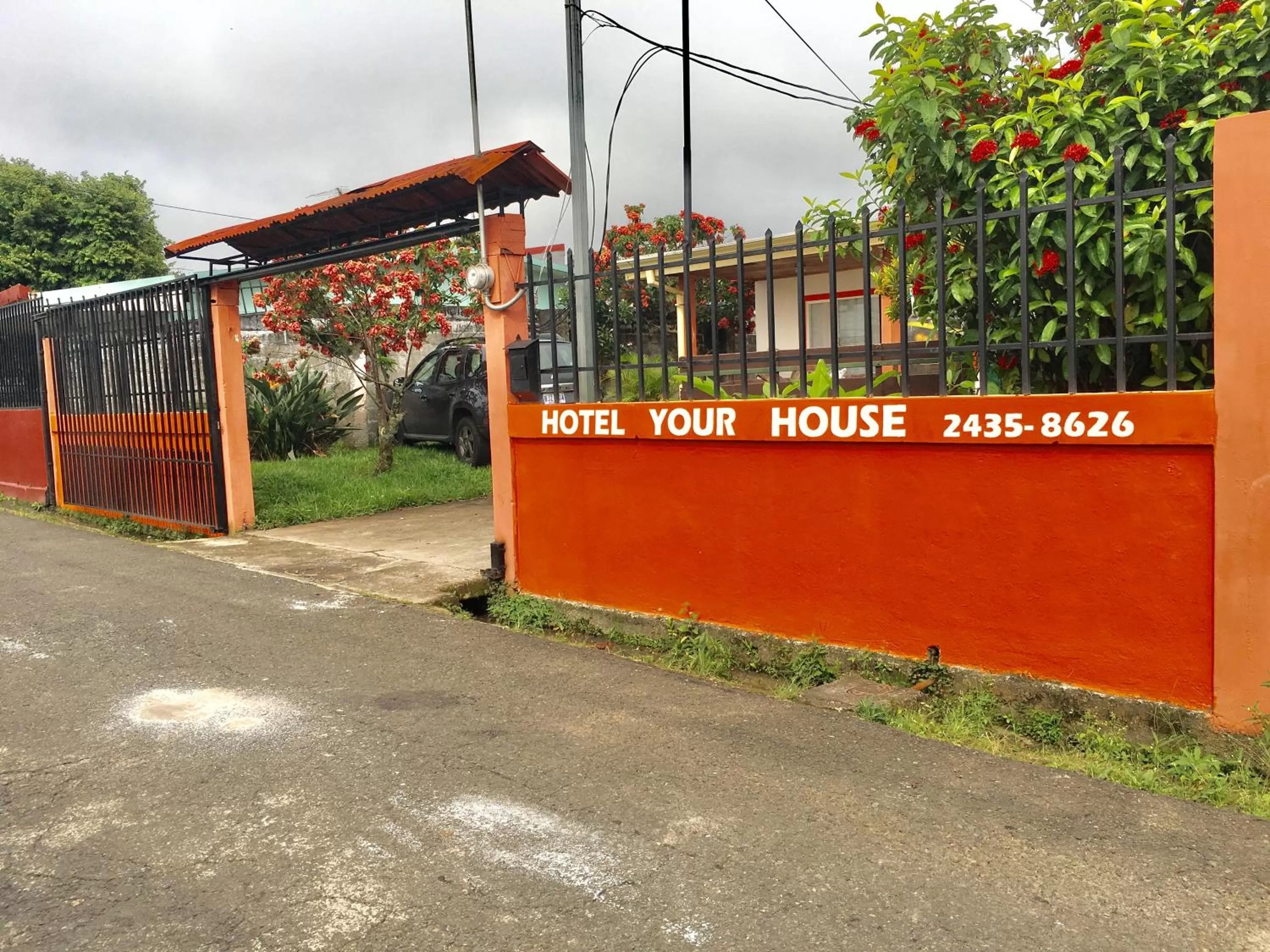 Property logo or sign in Hotel Your House