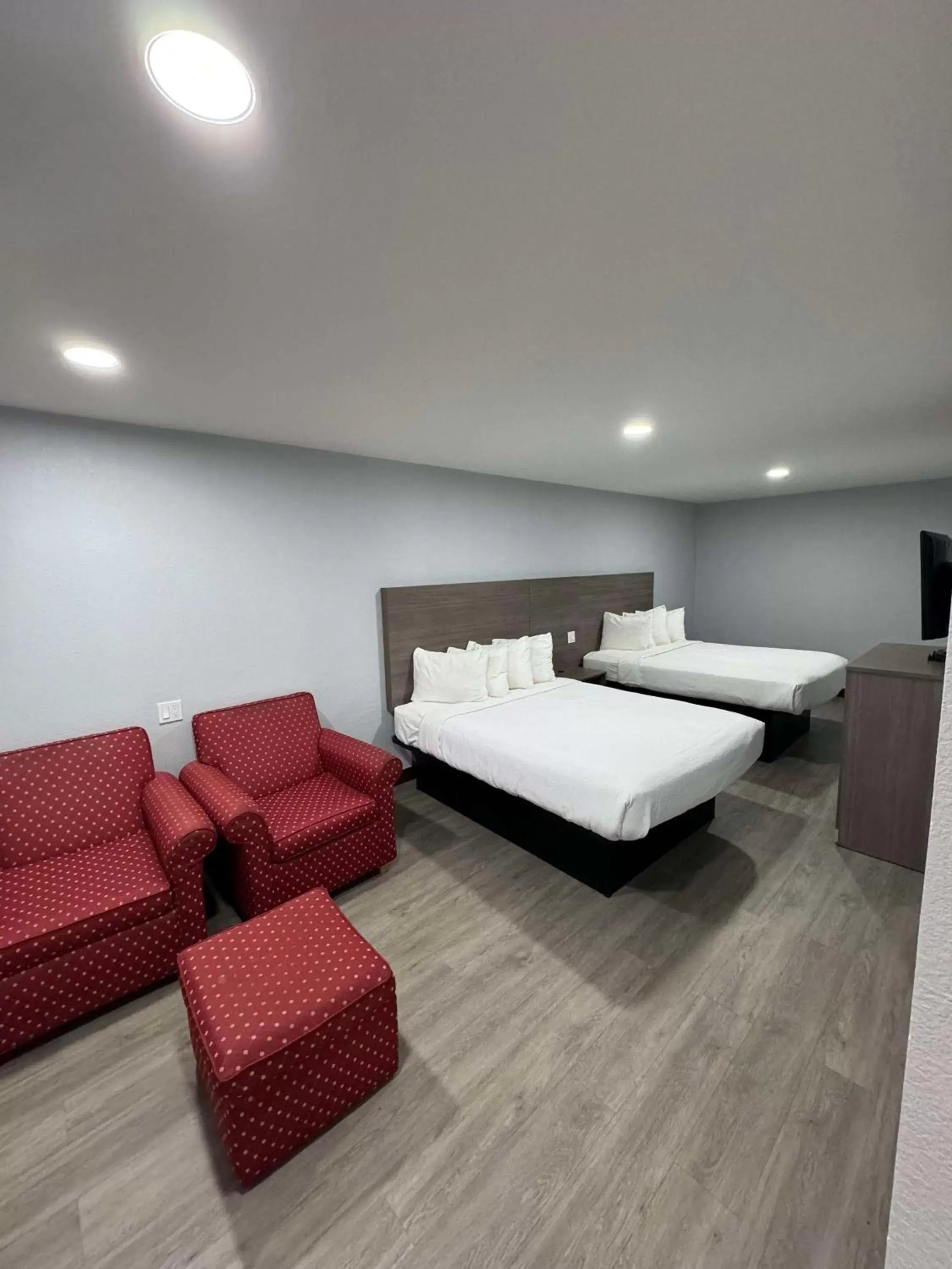 Queen Room with Two Queen Beds and Bath Tub - Disability Access in SureStay Hotel by Best Western Childress Queen Room with Two Queen Beds and Bath Tub - Disability Access in SureStay Hotel by Best Western Childress