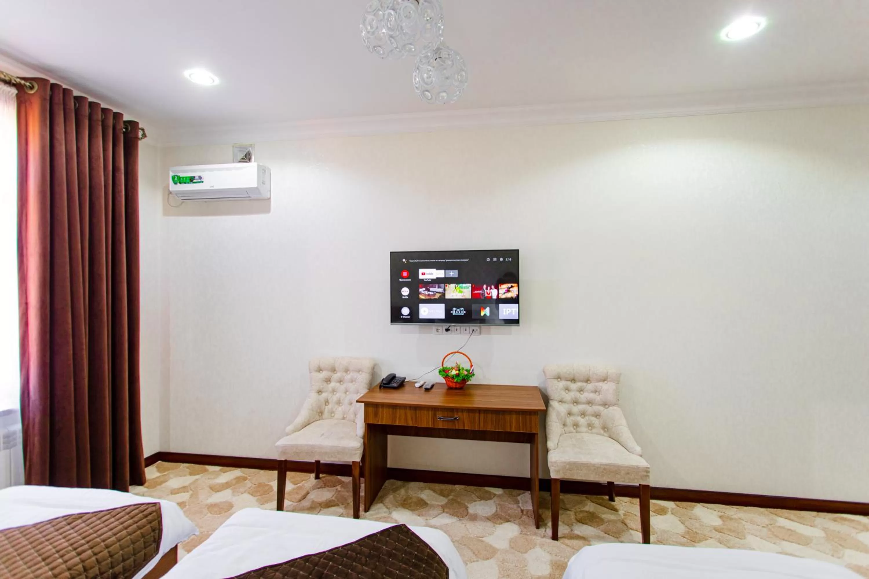 Photo of the whole room, TV/Entertainment Center in Diyor Gold Hotel