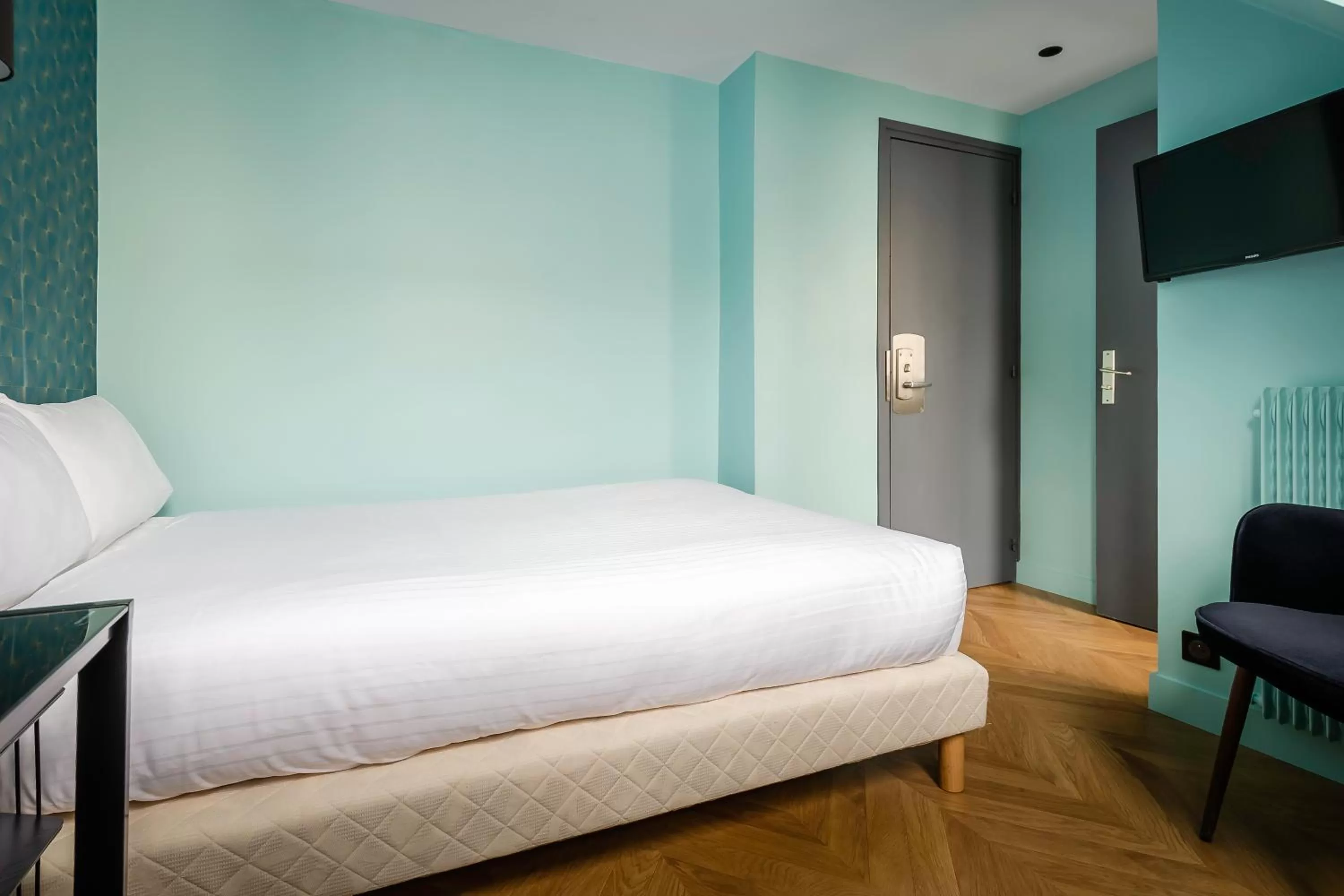 Bed in Hotel Elysée Etoile