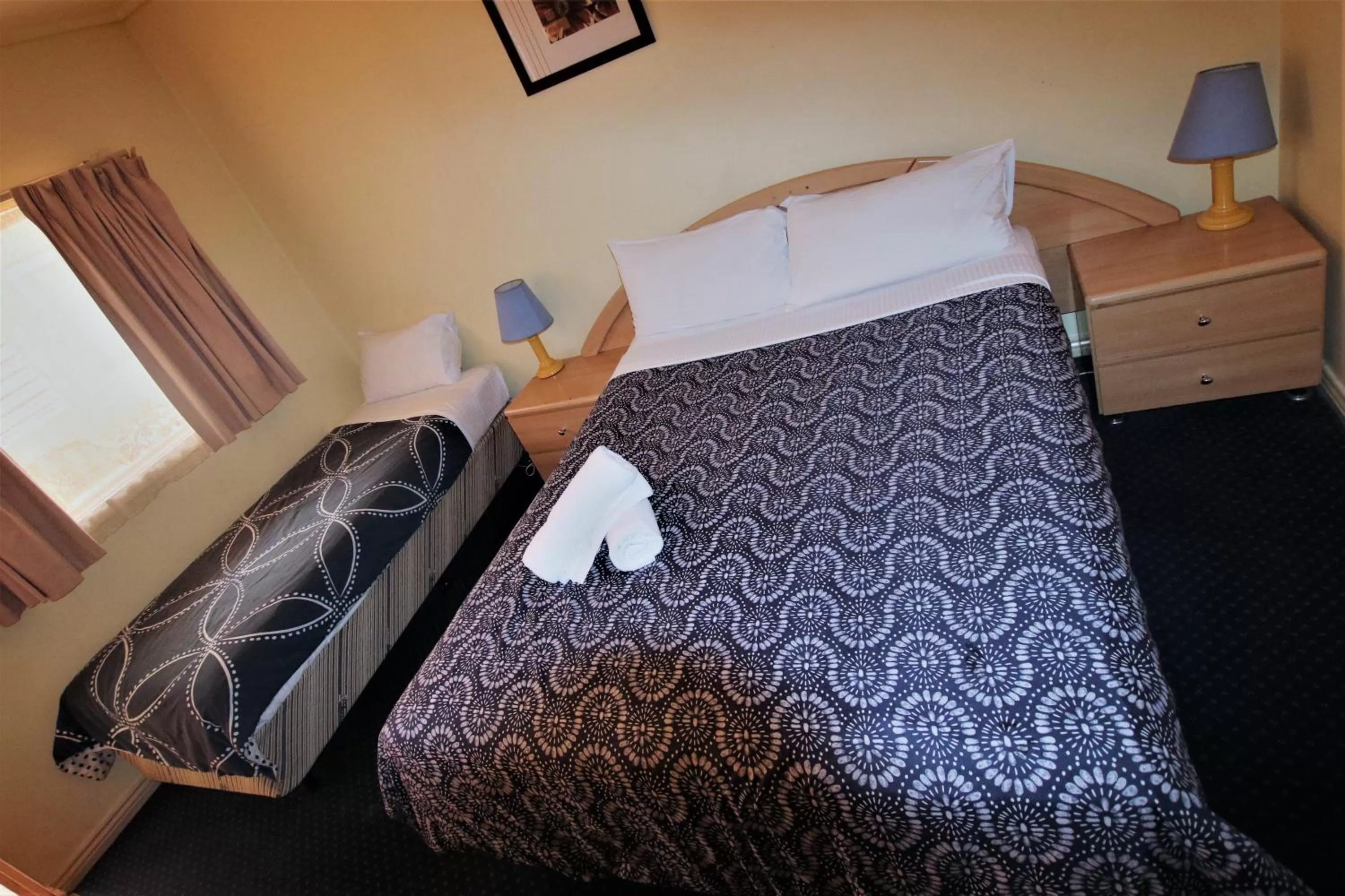 Bed in City East Motel