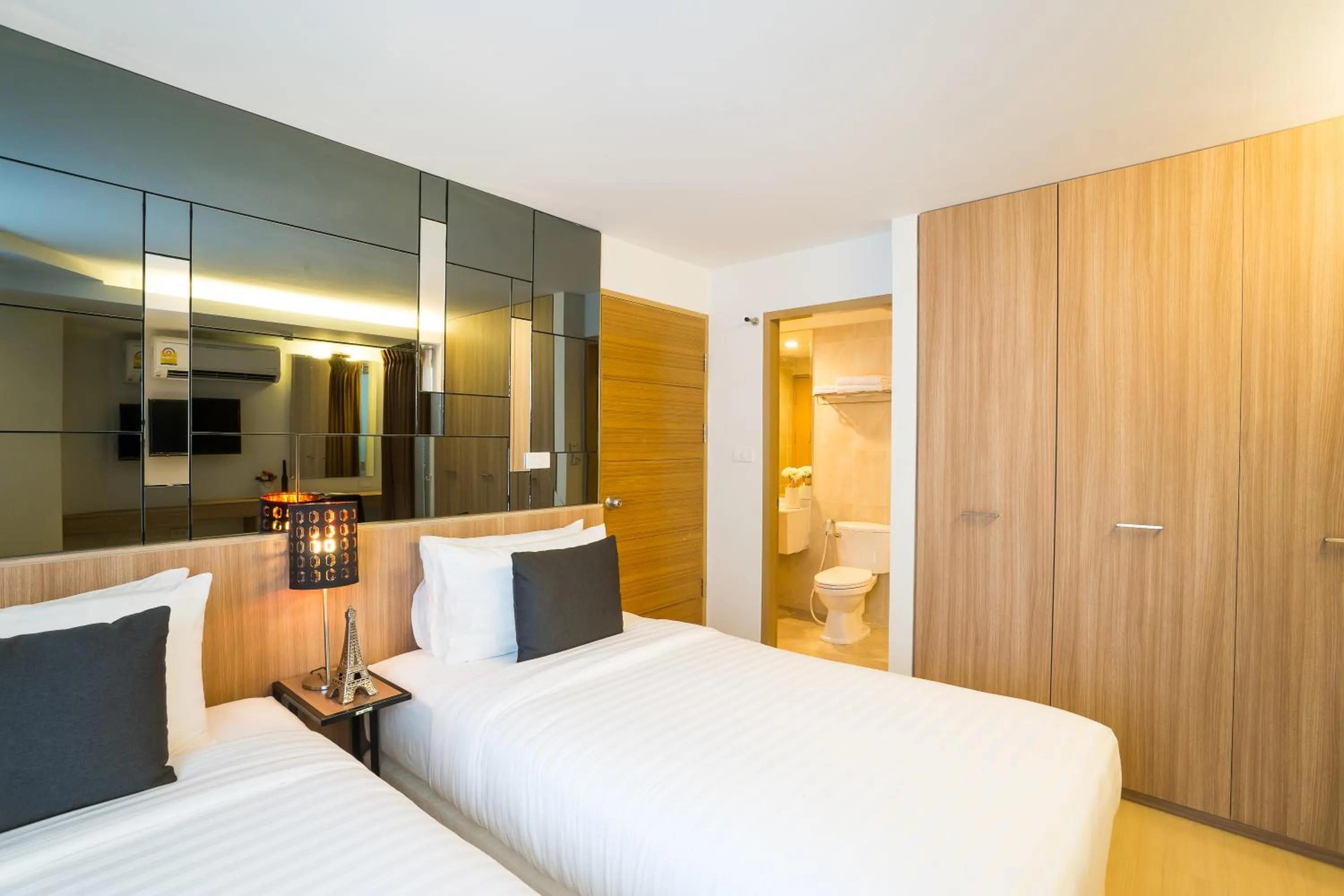 Photo of the whole room, Bed in Beyond Suite