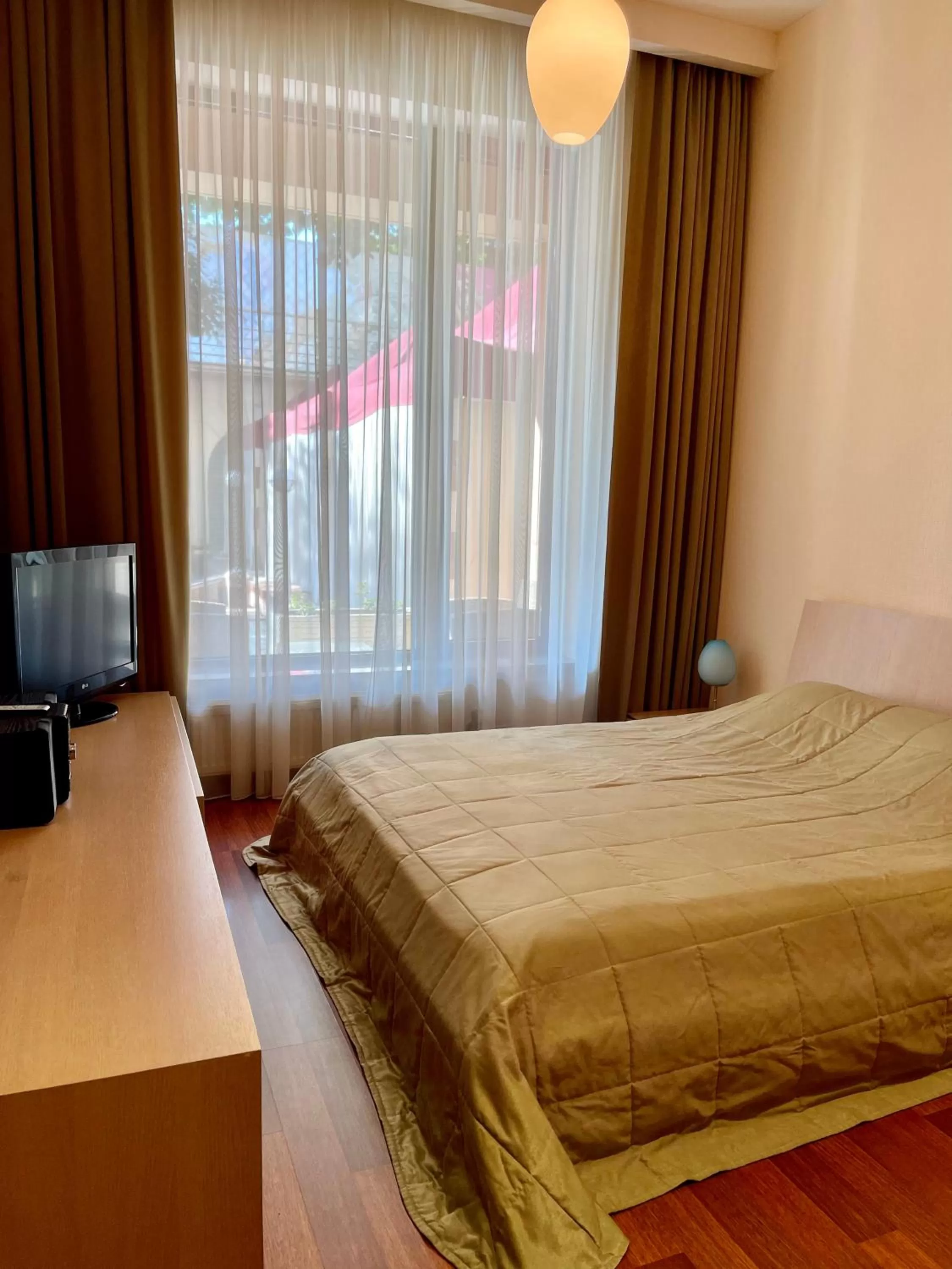 Bed in Arcada Apartments