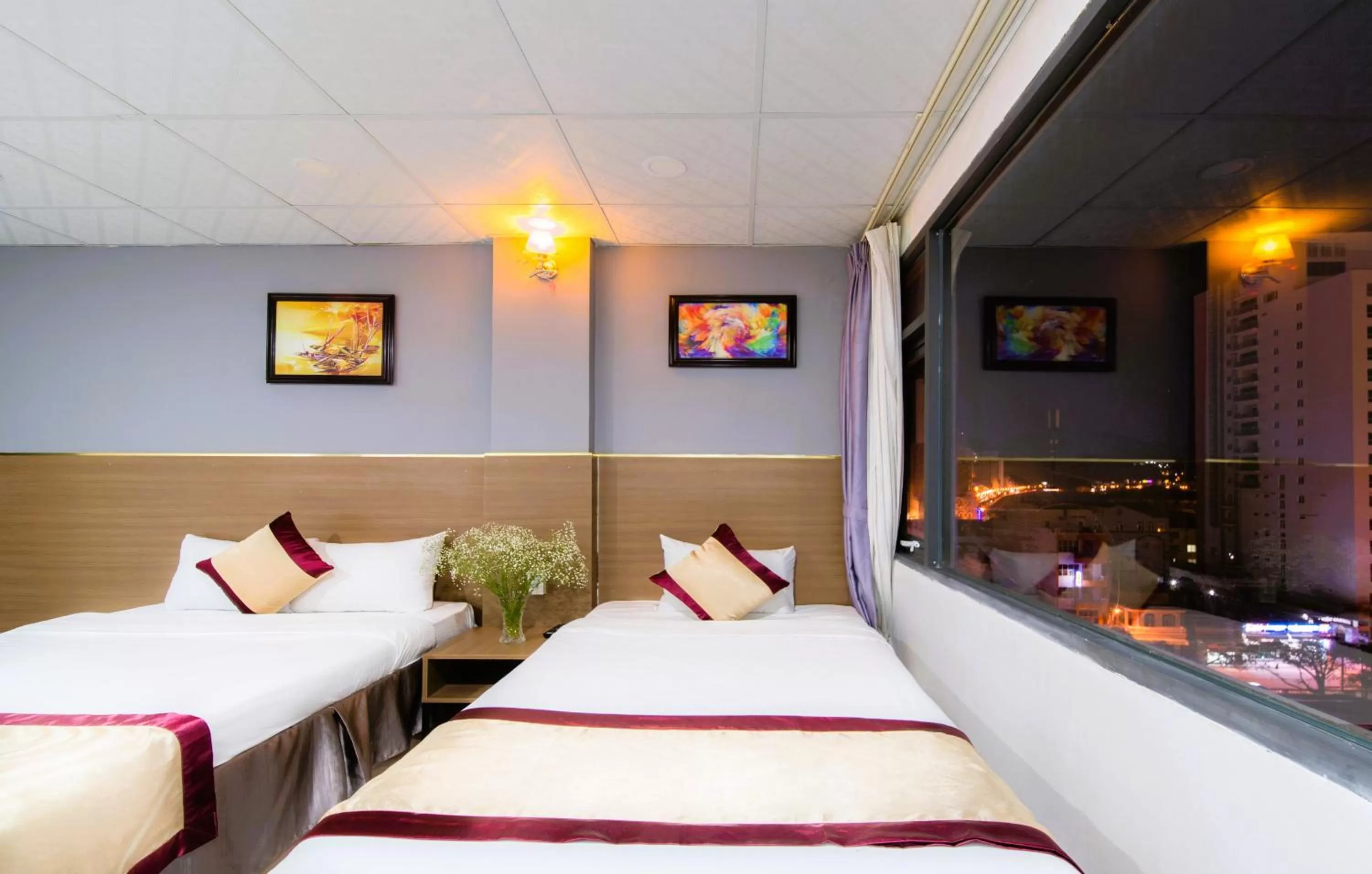 Bed in Arise Seaside Hotel