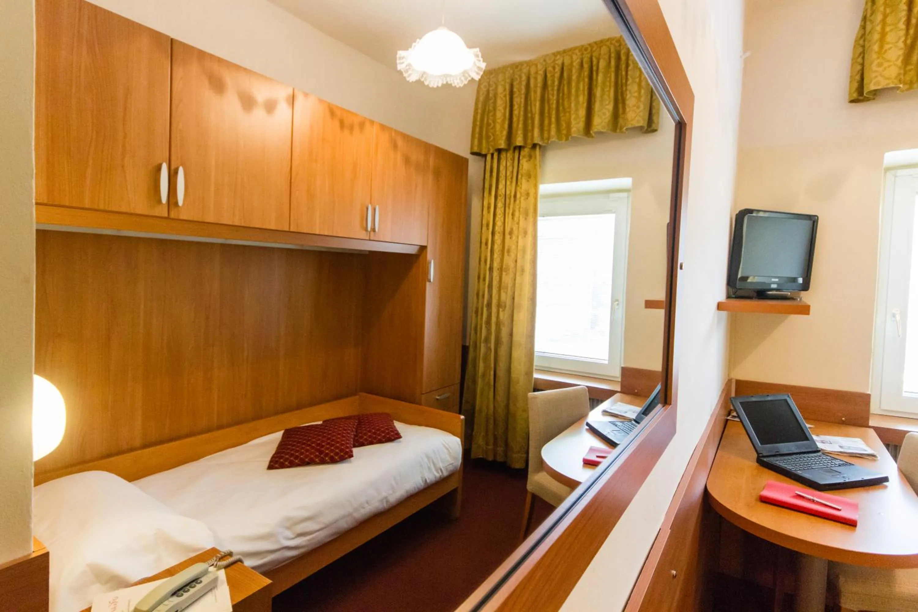 Bed in Hotel Sant'Ilario