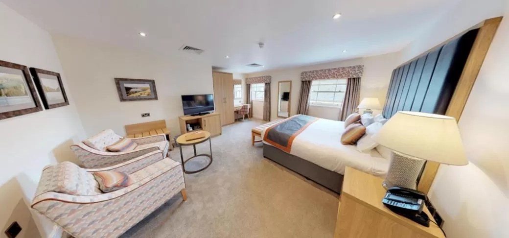 Photo of the whole room, Bed in The H Boutique Hotel