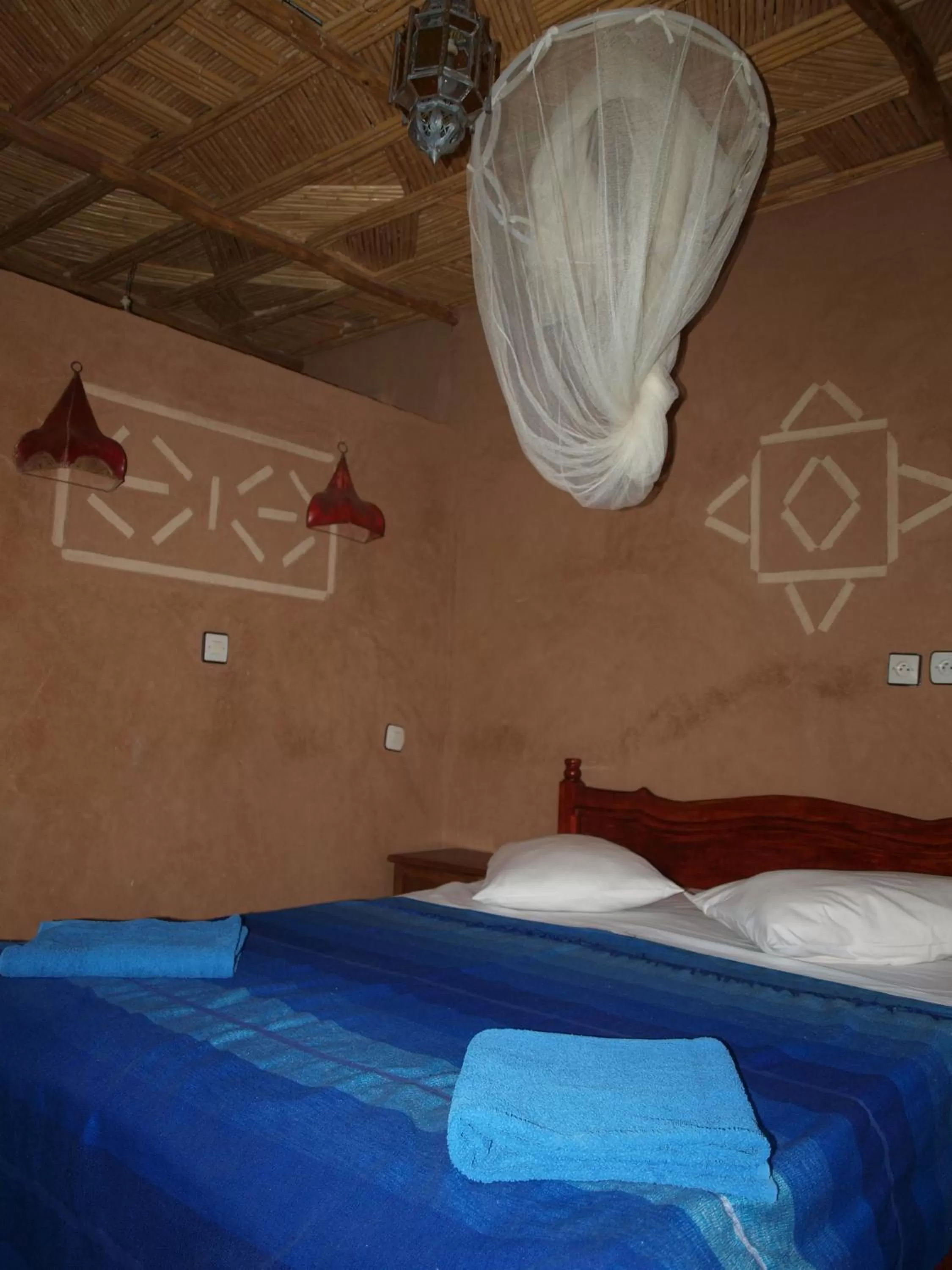 Bed in Maison d'Hôte Valentine