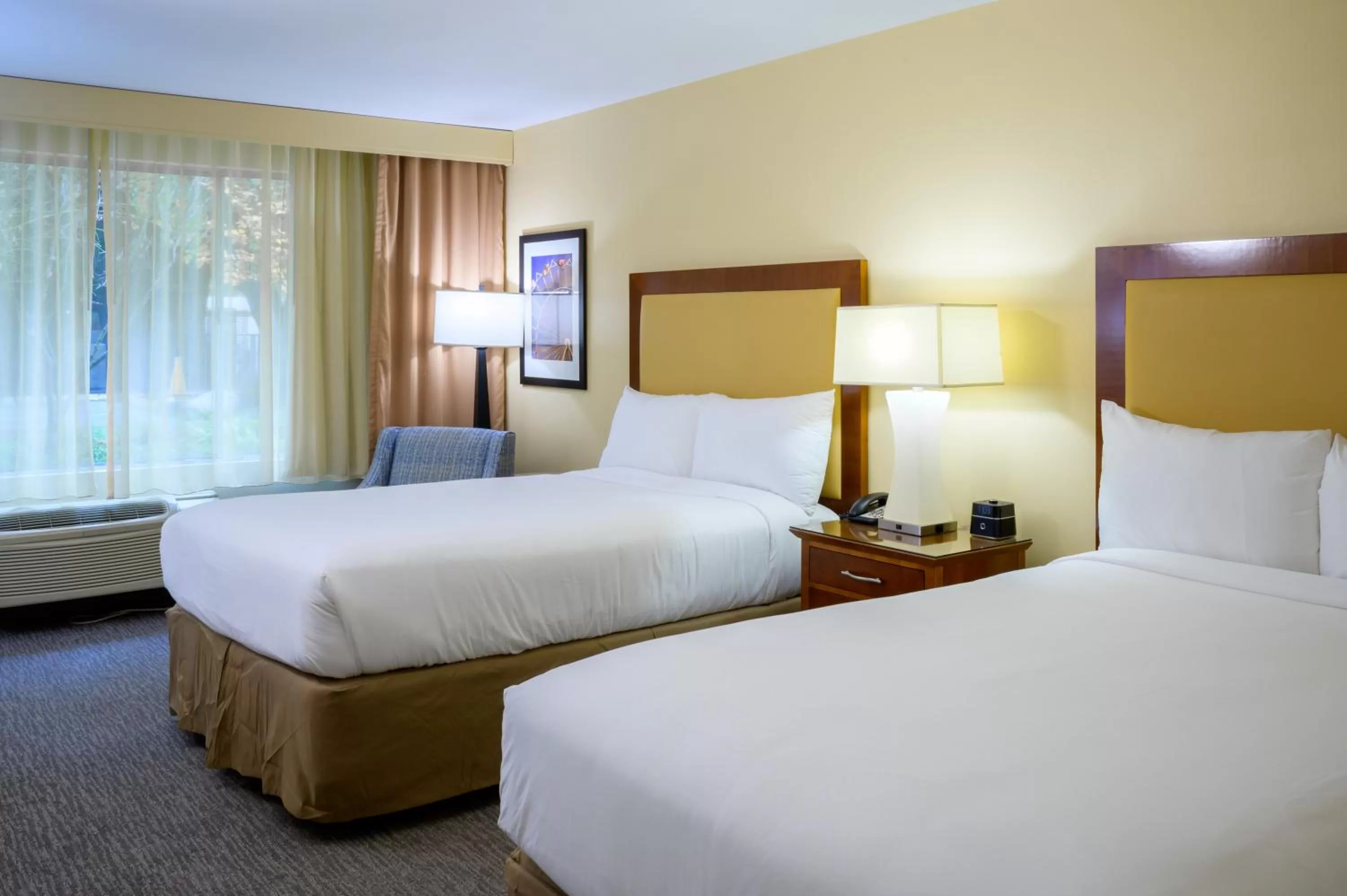 Bed in Airtel Plaza Hotel