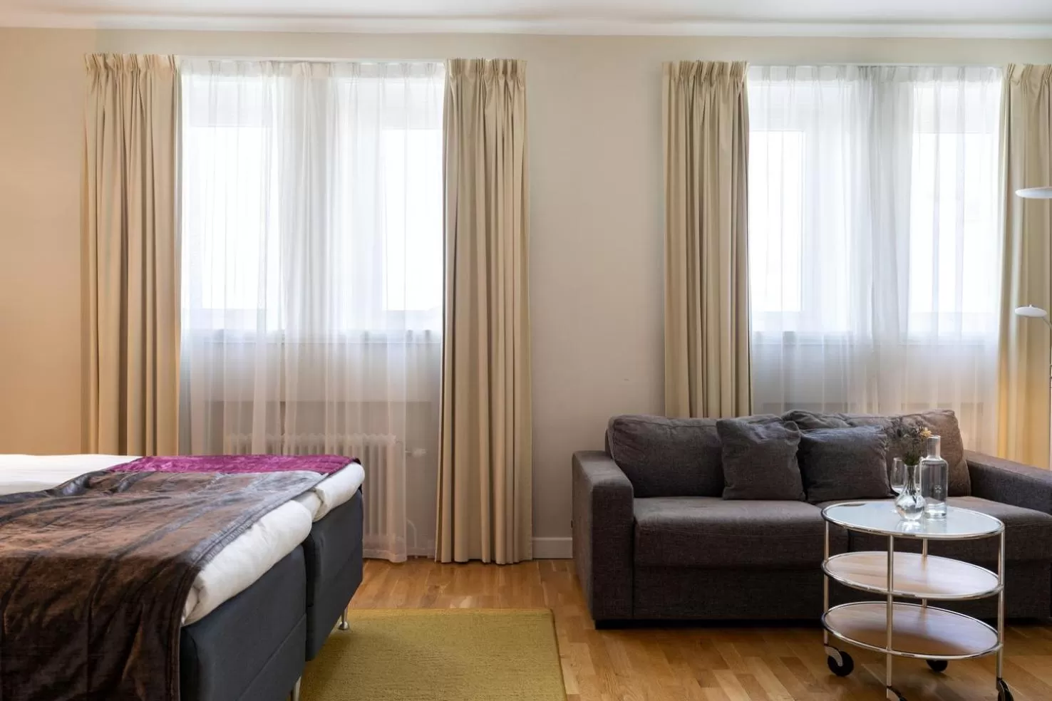 Living room, Bed in Elite Stadshotellet Växjö