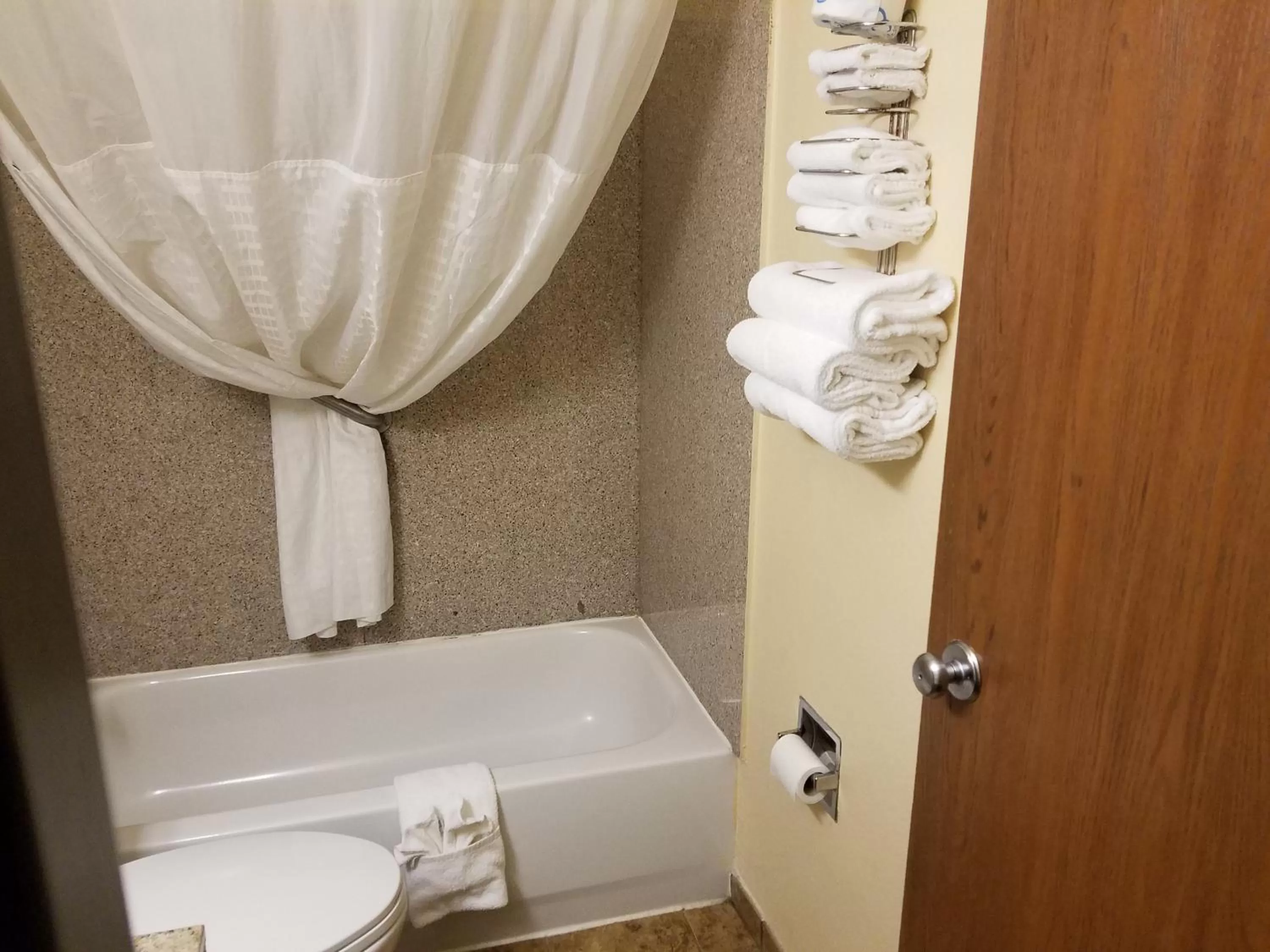 Bathroom in Super 8 by Wyndham Independence Kansas City
