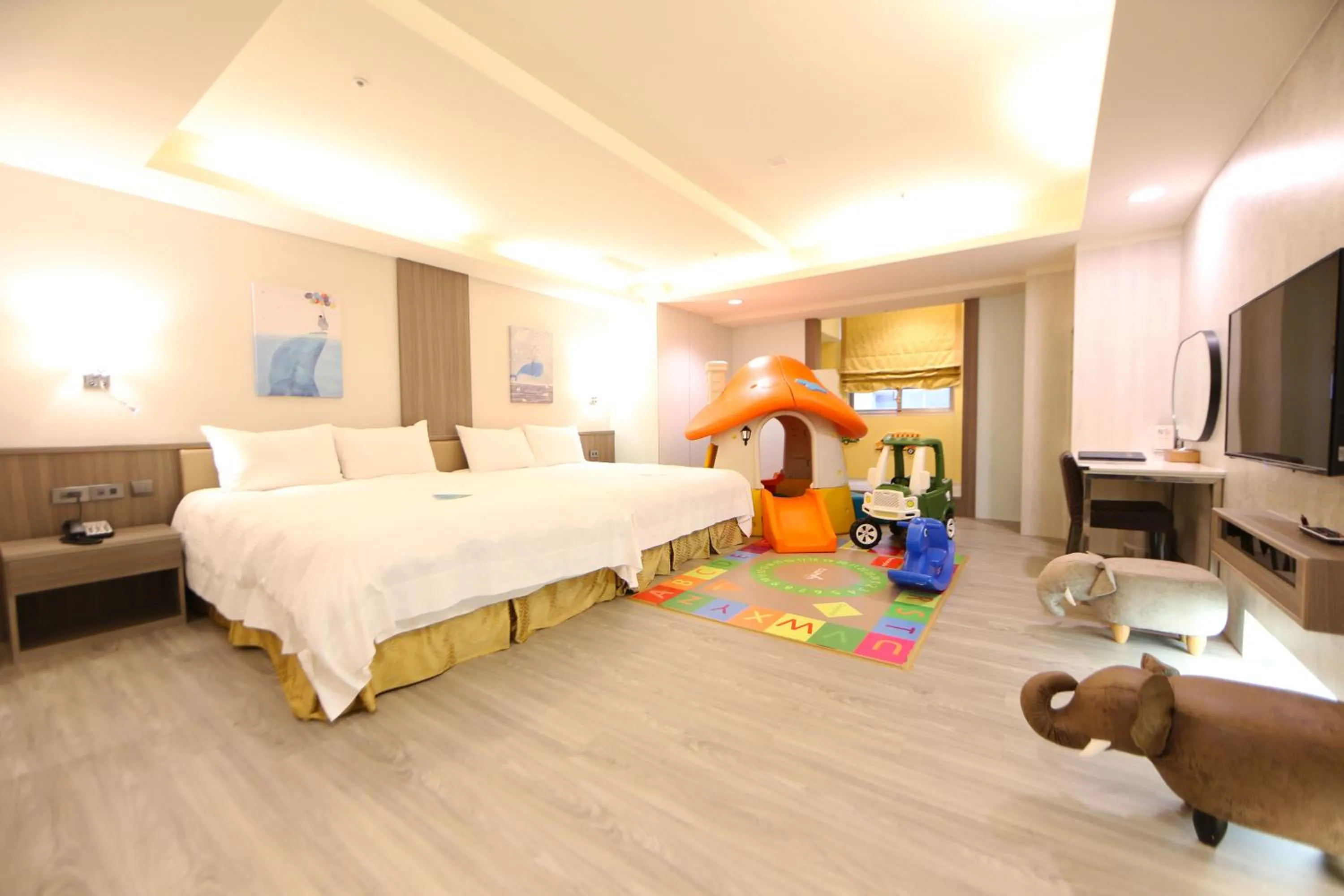 Bed in Grand Earl Hotel