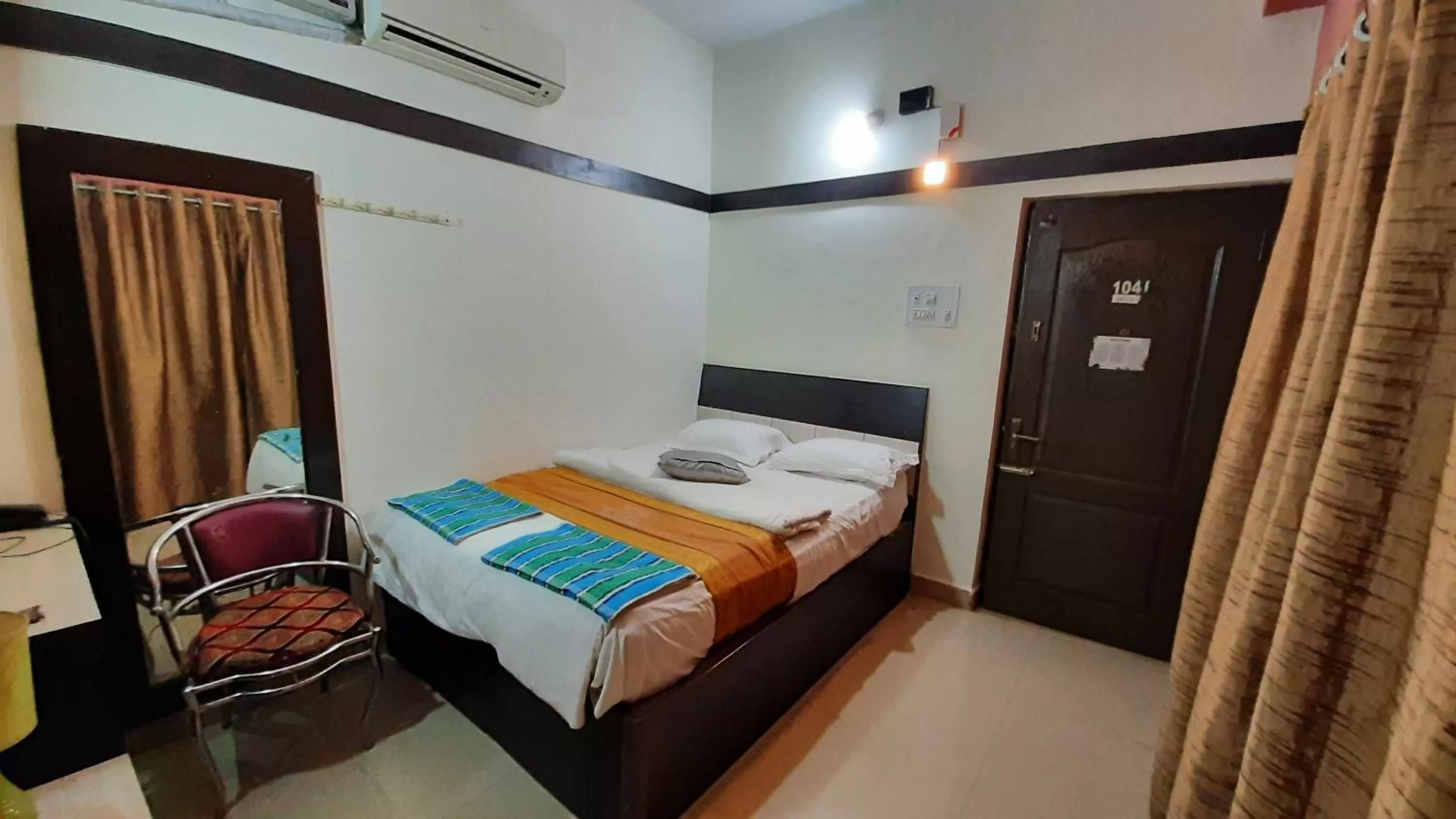 Photo of the whole room, Bed in Royal Mughal