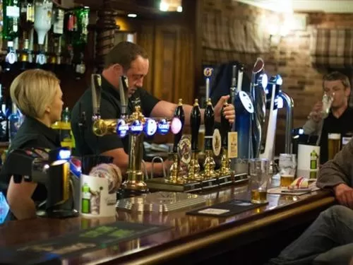 Lounge or bar in The Oaks Hotel