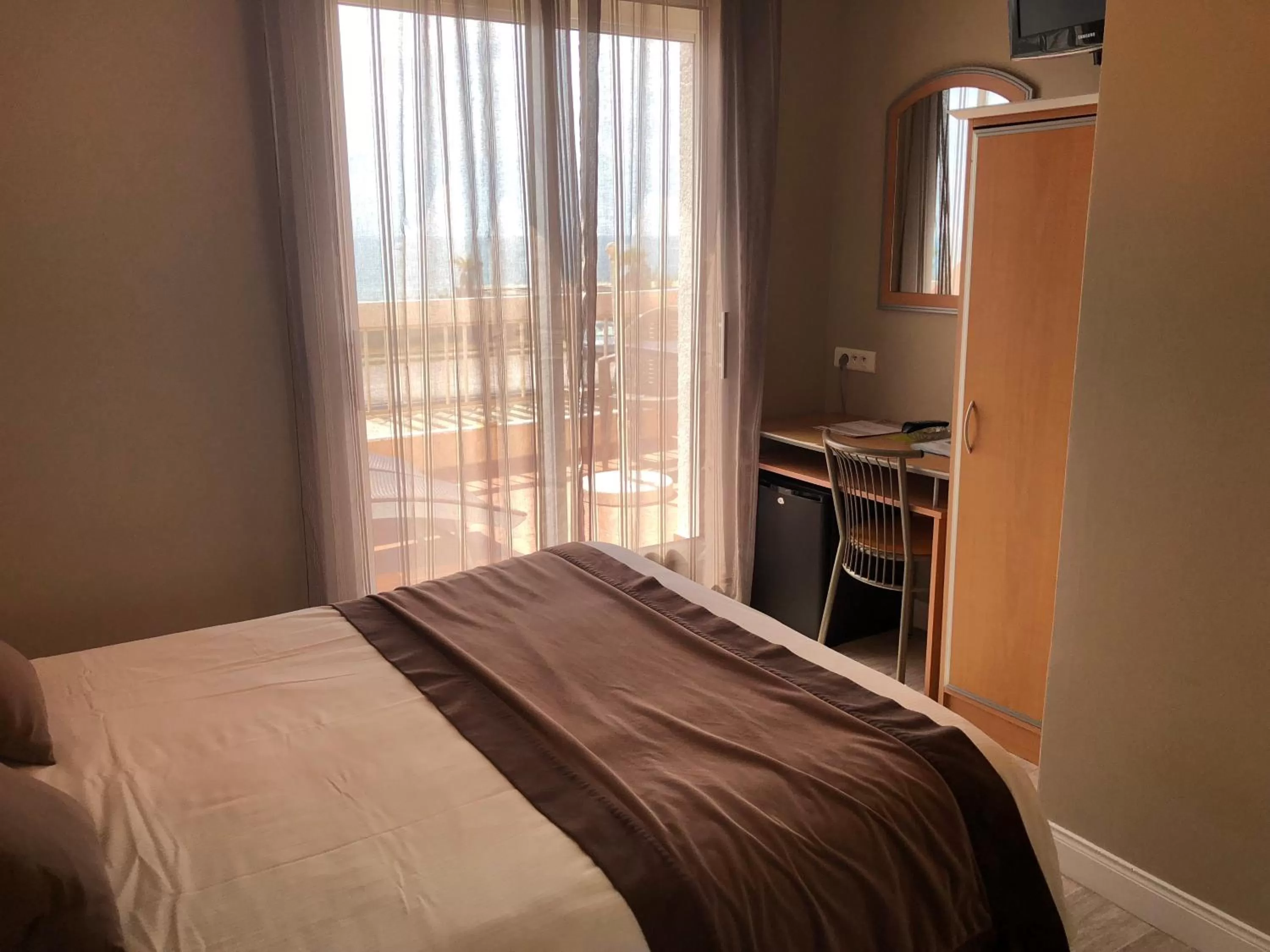 Bed in Logis Hotel Restaurant le Mirador