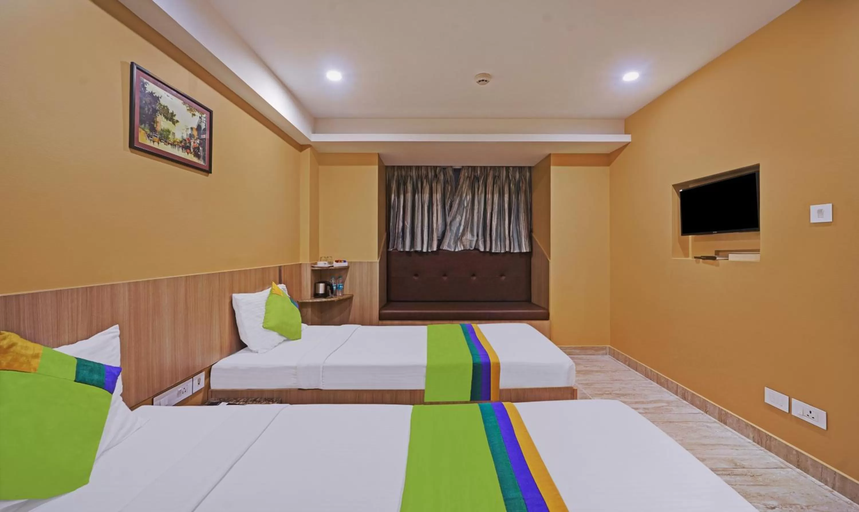 Bedroom, Bed in Treebo Fourth Avenue