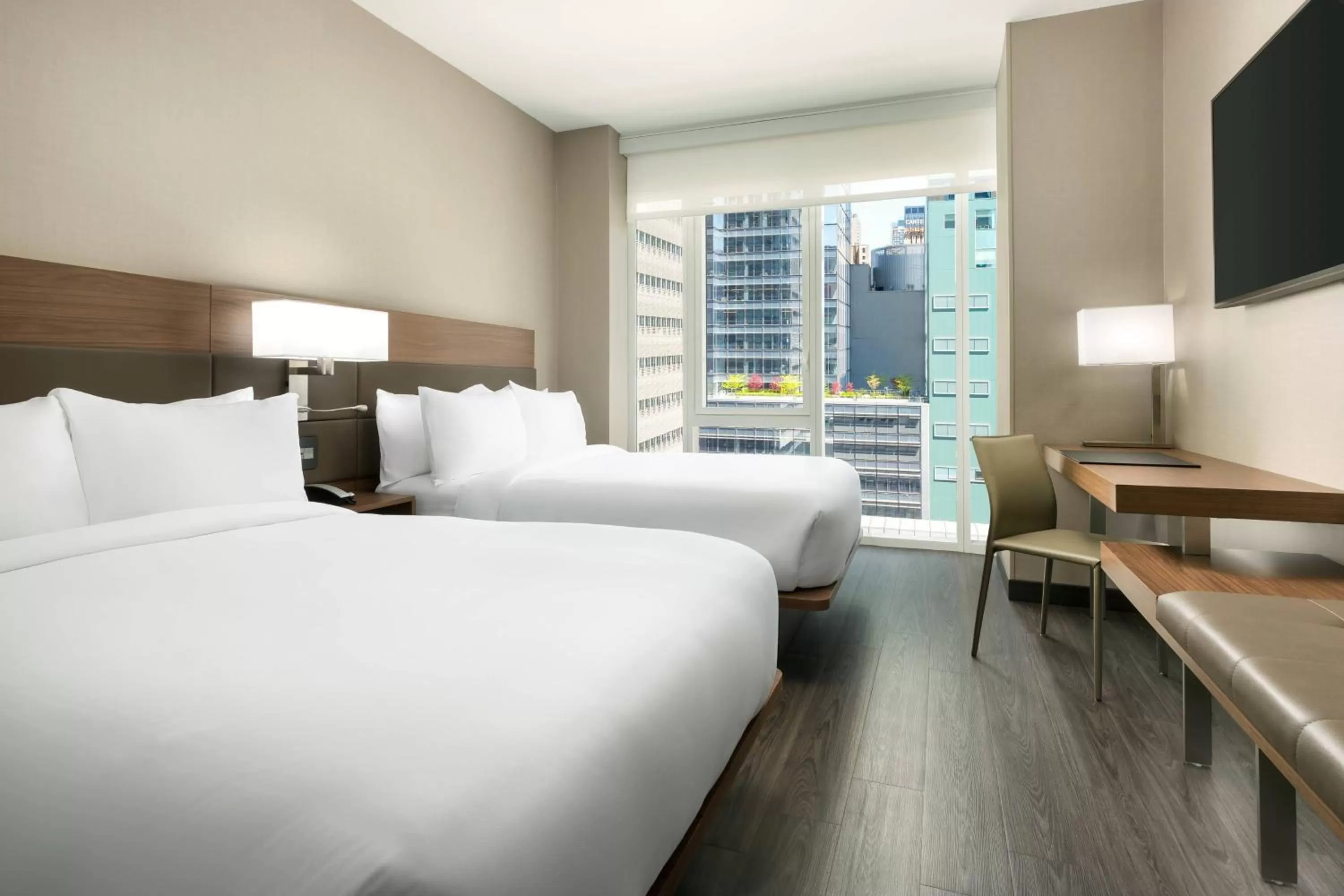 Photo of the whole room, Bed in AC Hotel by Marriott New York Times Square