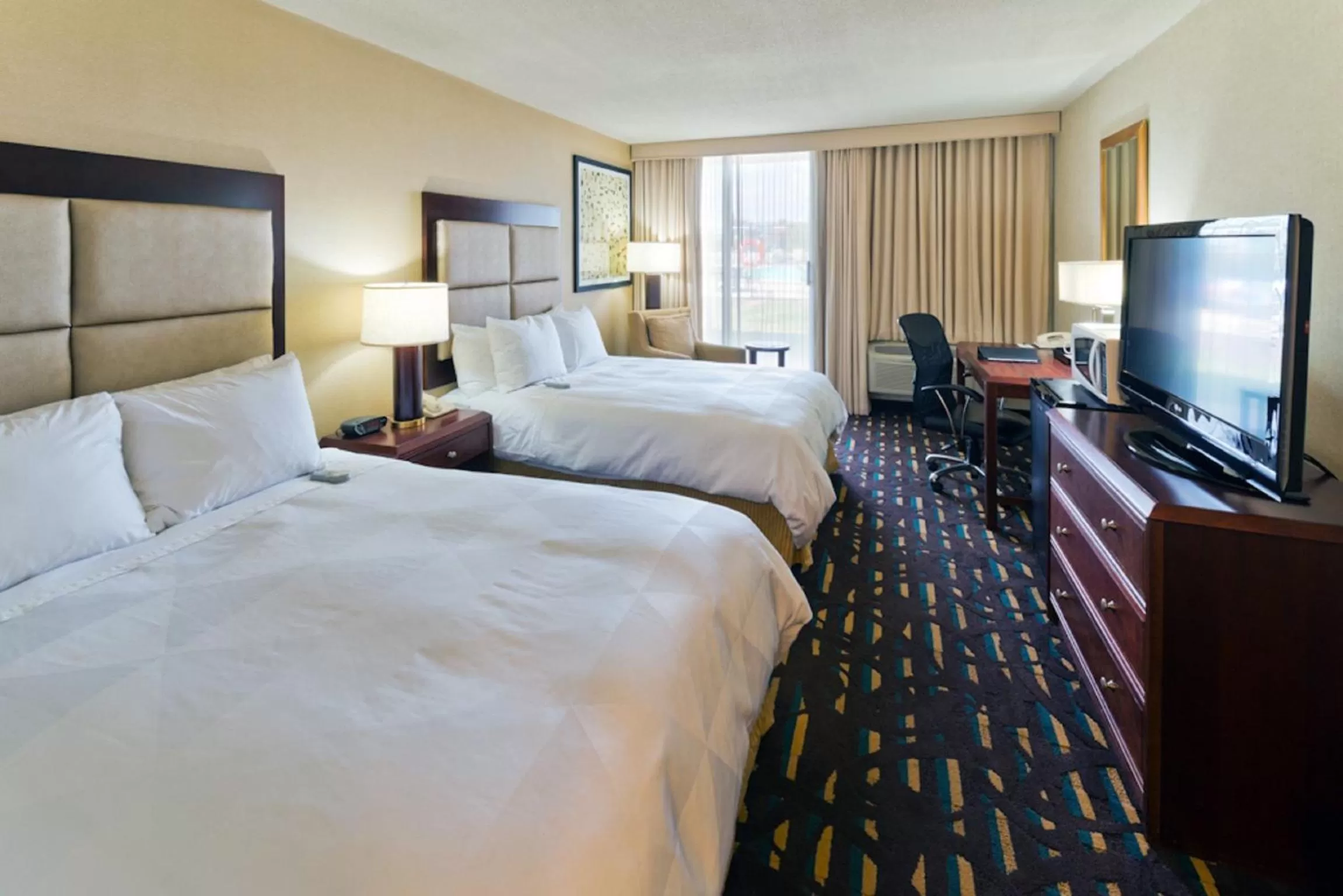 Photo of the whole room, Bed in Wyndham Chicago O'Hare