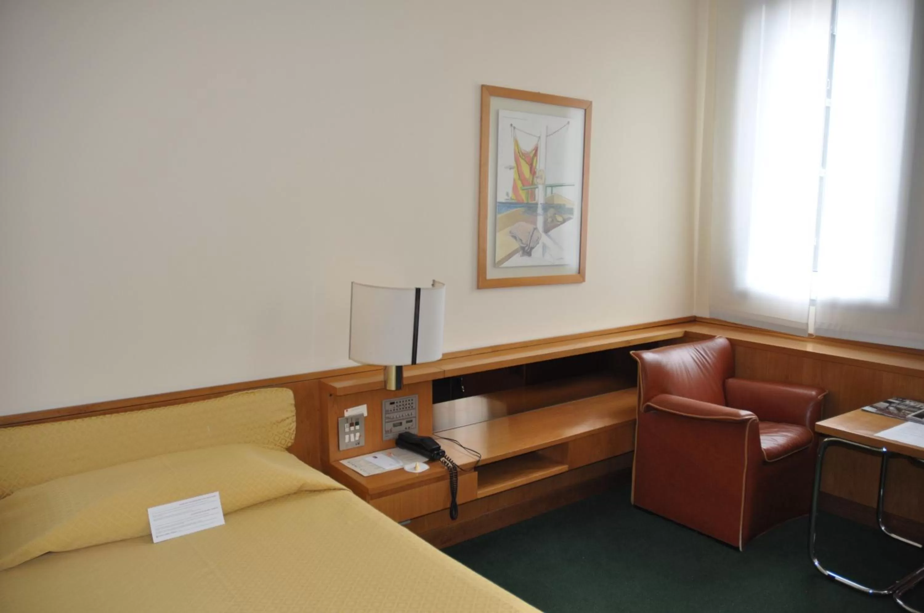 Seating area, Bed in Hotel Galileo