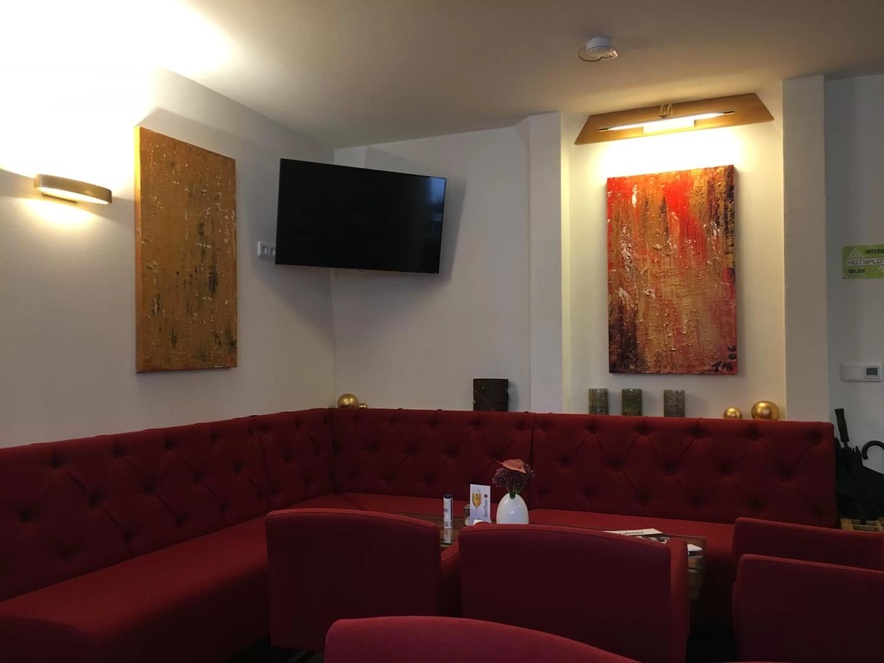 Lobby or reception, TV/Entertainment Center in Fachwerk-Hotel Eisenbart