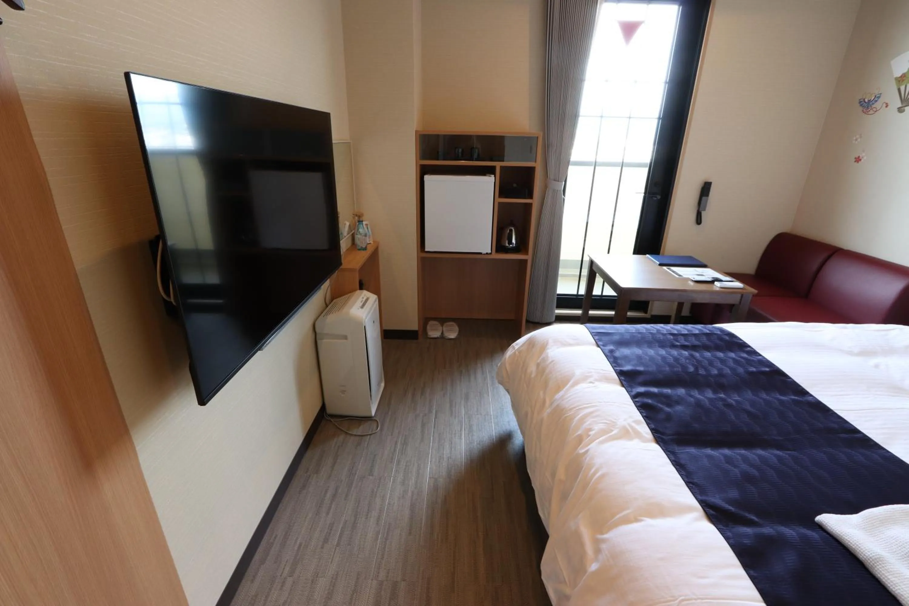 Photo of the whole room, Bed in Hotel Kanade Kanku Kaizuka