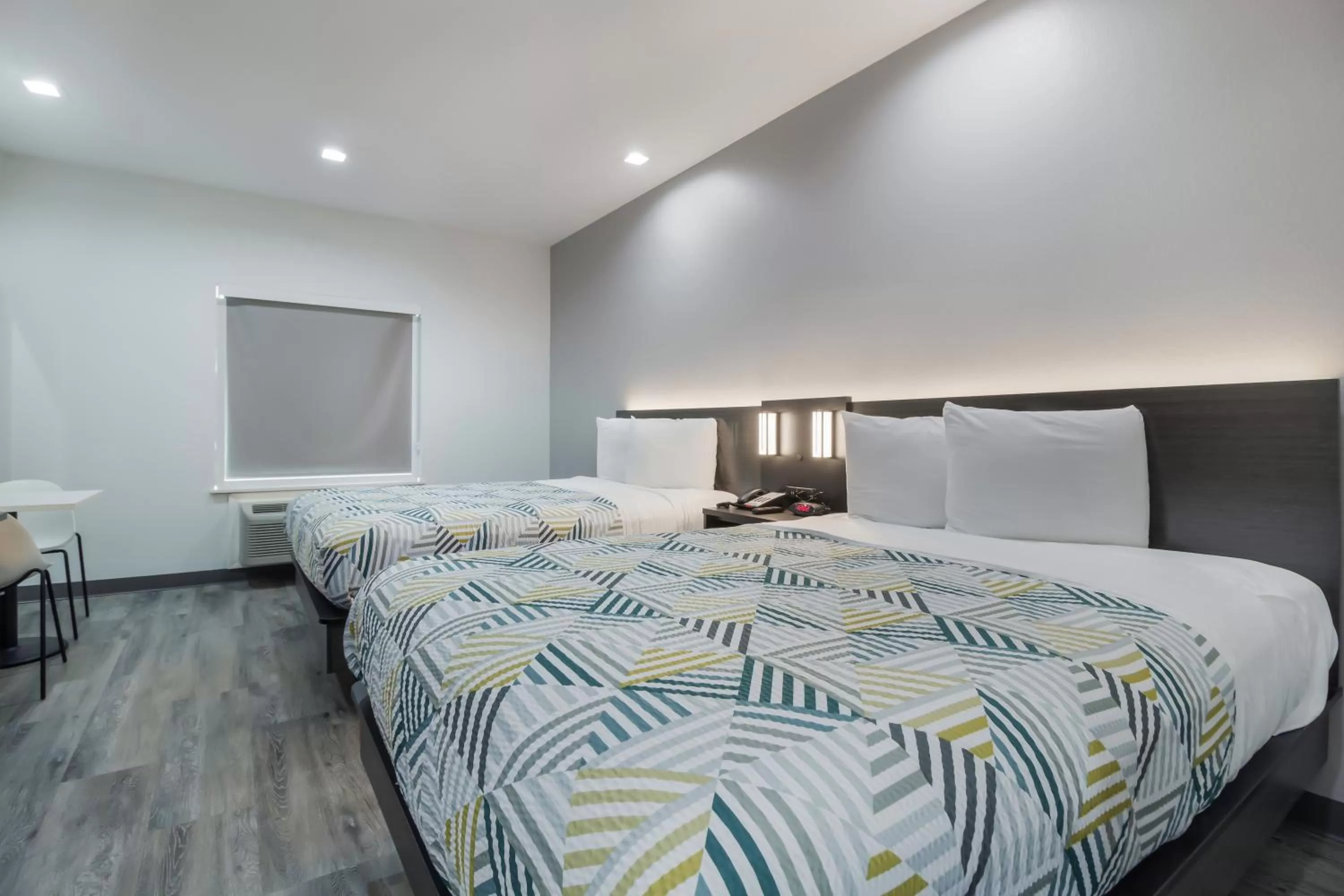 Bed in Studio 6 Katy, Tx