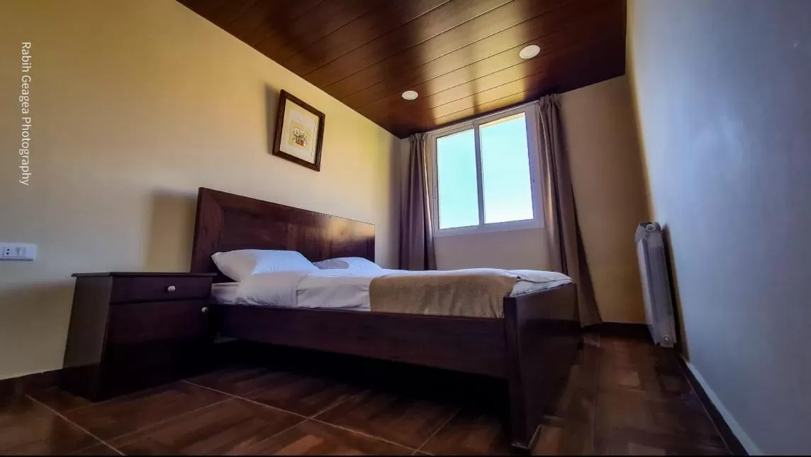 Bed in Hotel L'Aiglon