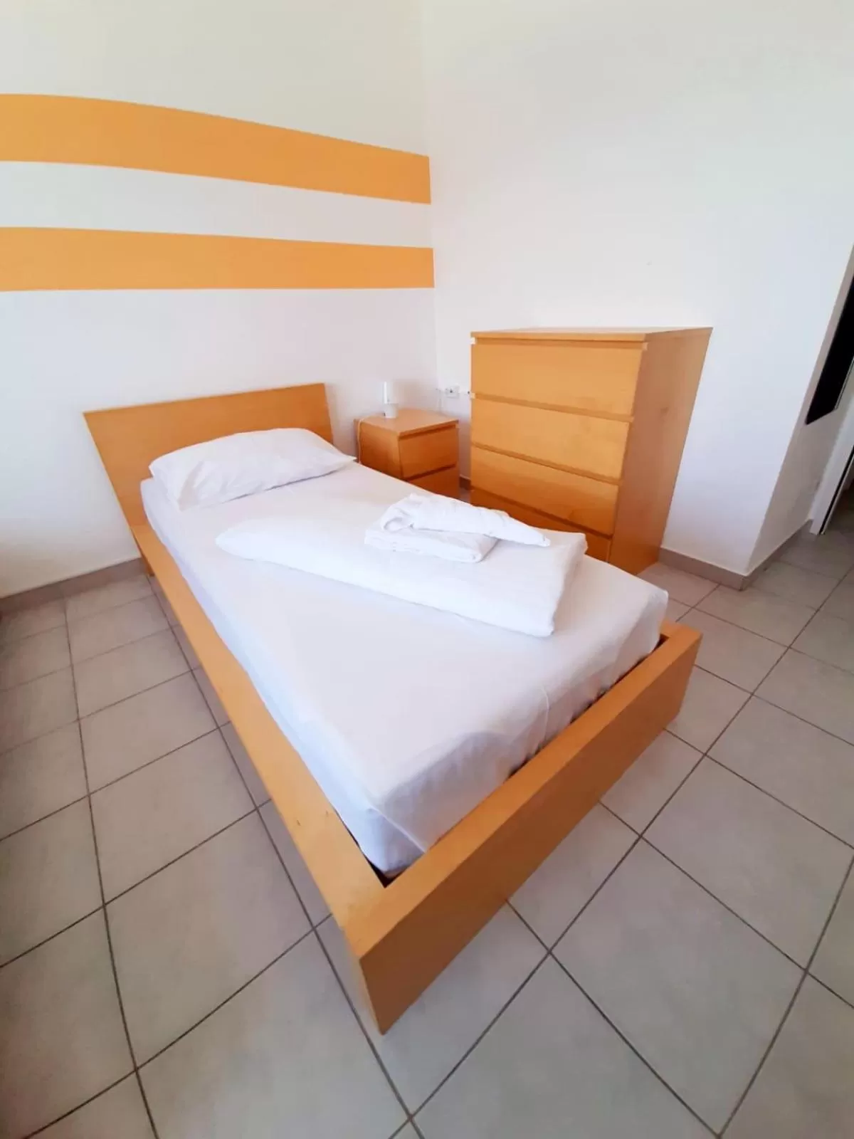 Bed in Lenas West Hotel