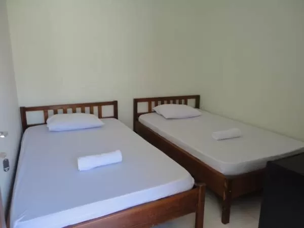 Bed in Jazz Senggigi Hotel