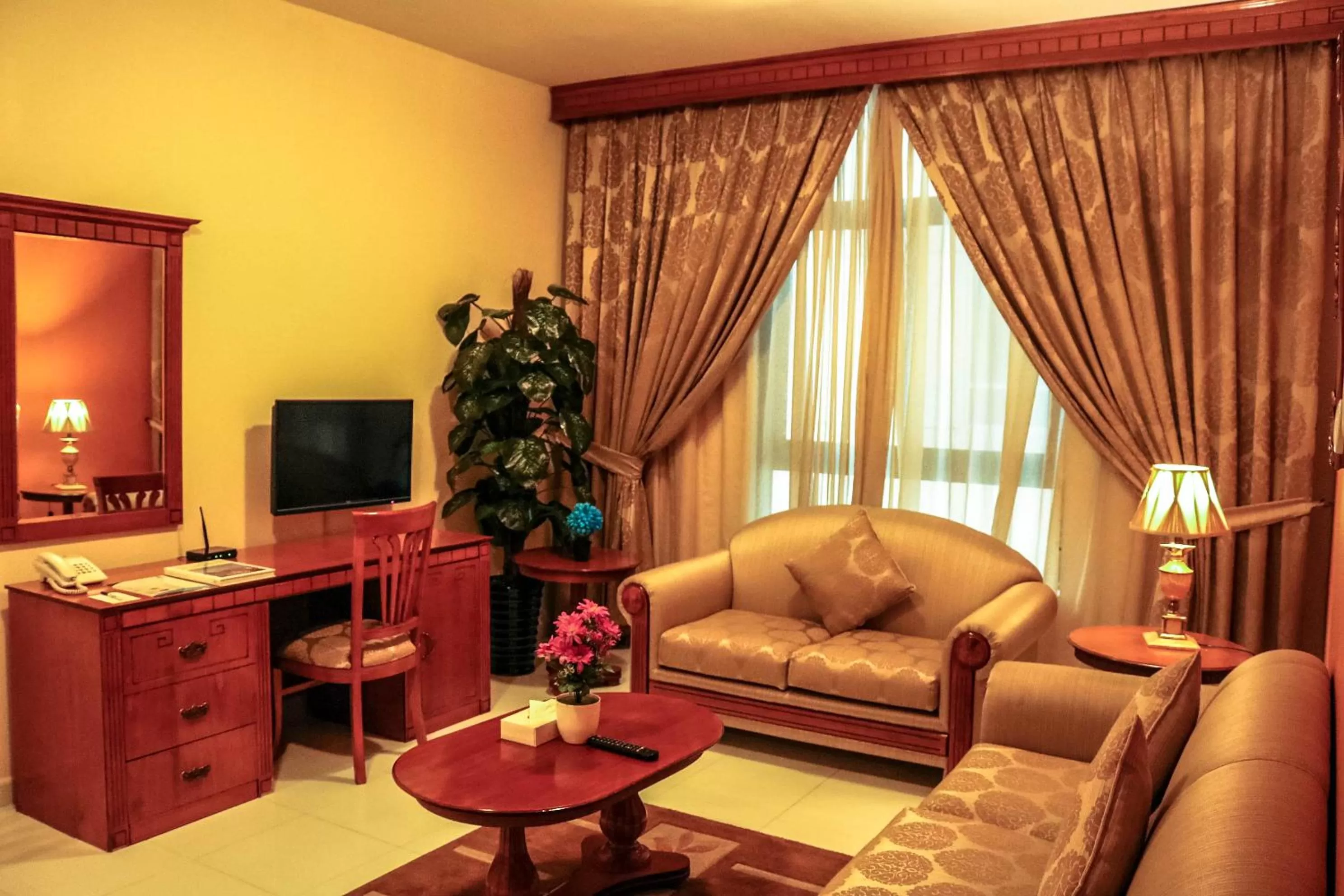 Living room in Al Maha Regency Hotel Suites - Managed by Aoudi Consultants