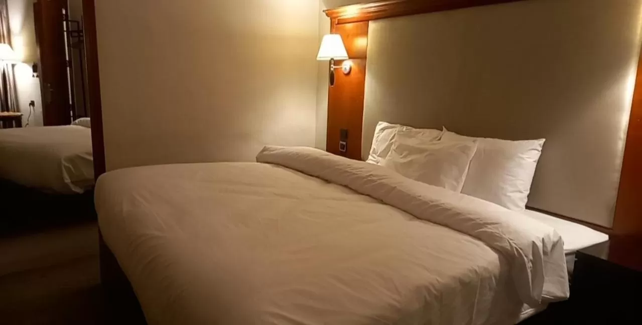 Bed in Amman Pasha Hotel