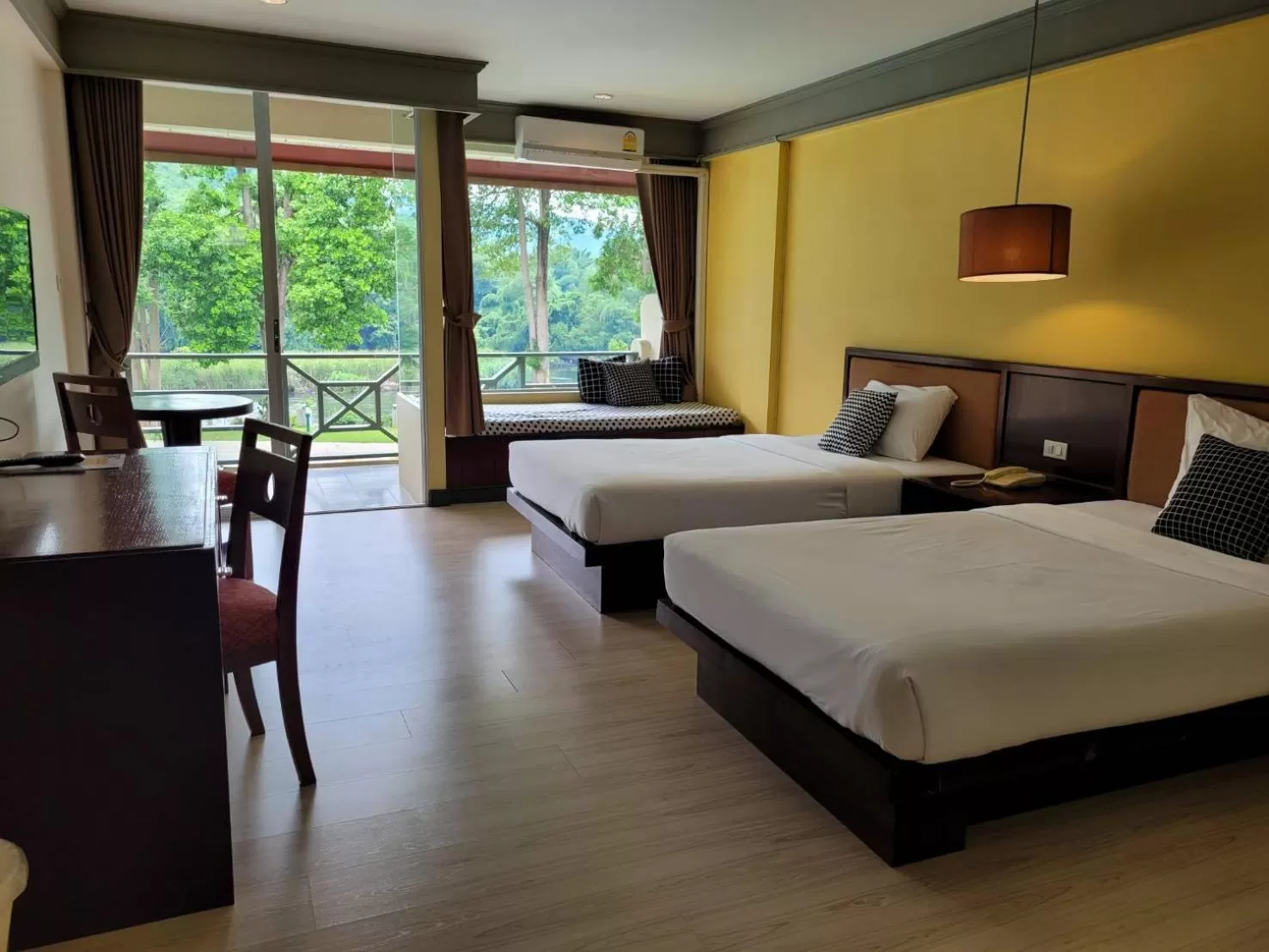 Photo of the whole room, Bed in Aekpailin River Kwai Resort