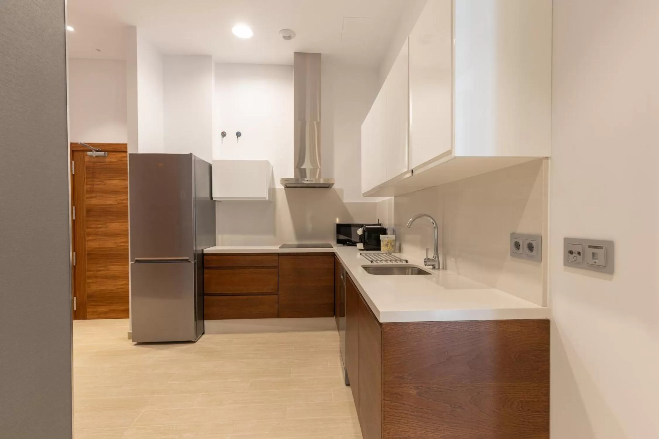 Kitchen or kitchenette in BiBo Suites San Agustín