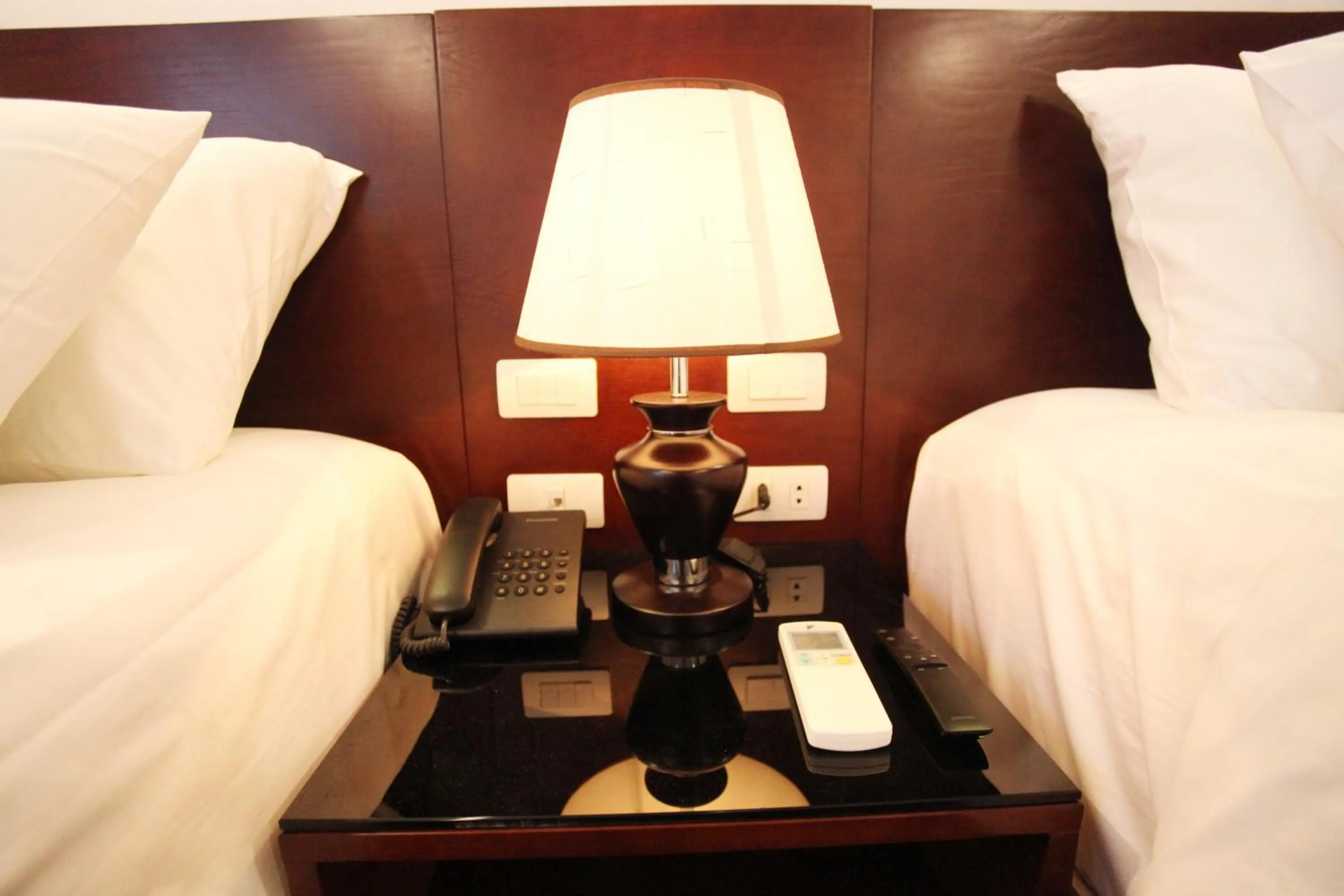 Decorative detail, Bed in Camellia Hotel