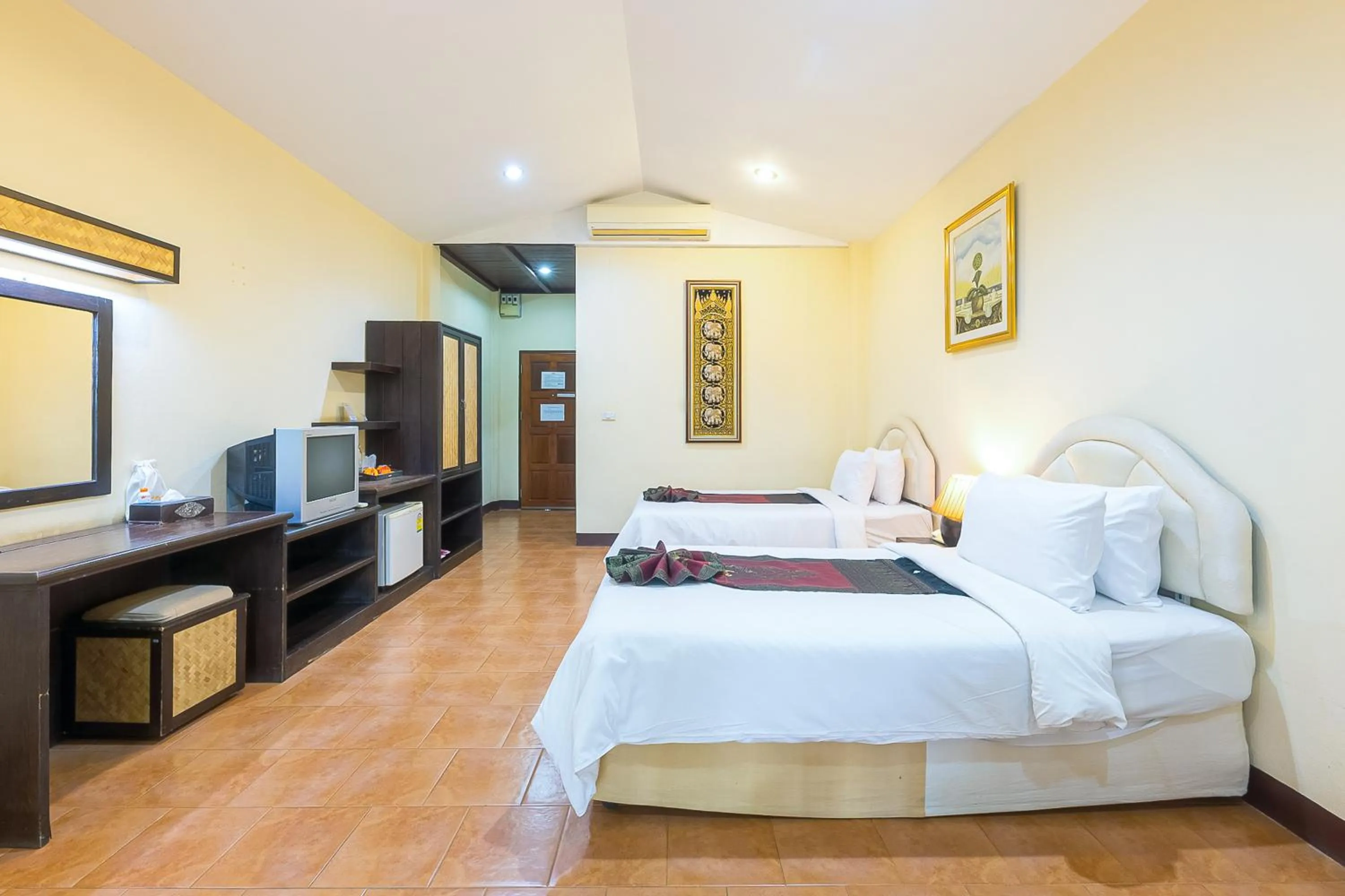 Bed in Silamanee Resort & Spa Hotel